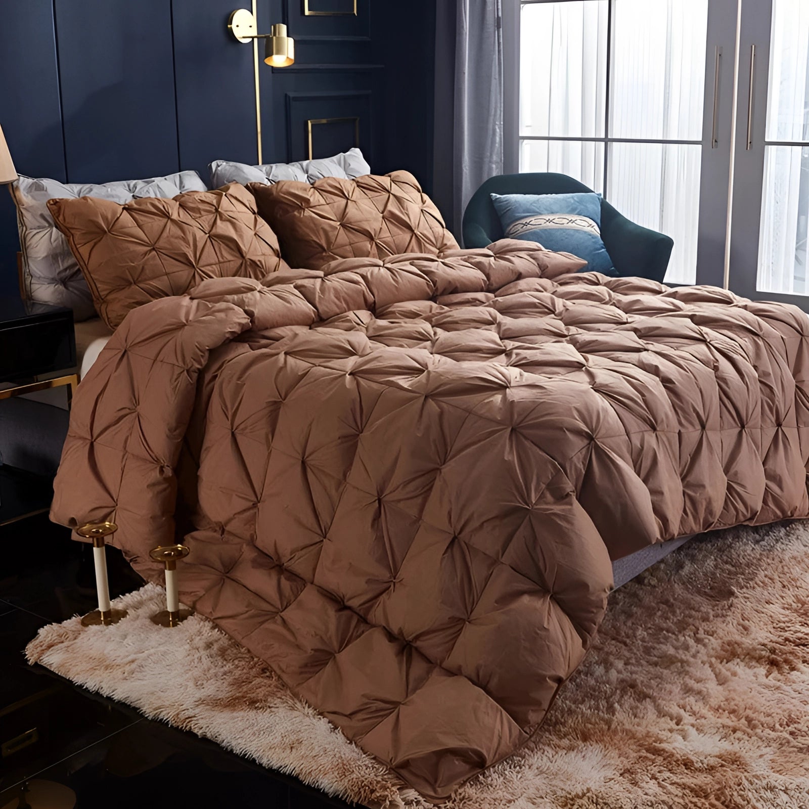 Luxury white pinch pleat comforter set on a California King bed with a textured design, surrounded by hardwood flooring and wooden bed frame.