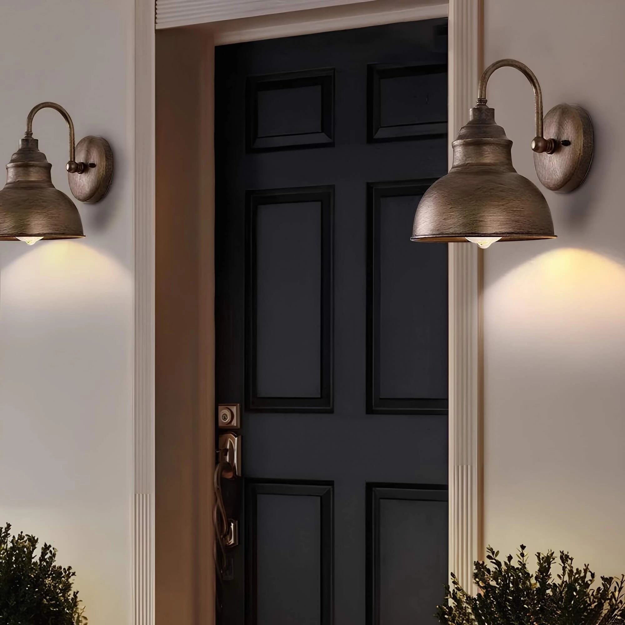Matte black vintage industrial wall sconce with Edison bulb mounted on a wooden wall, featuring a sleek shade and designed for stylish interior lighting.
