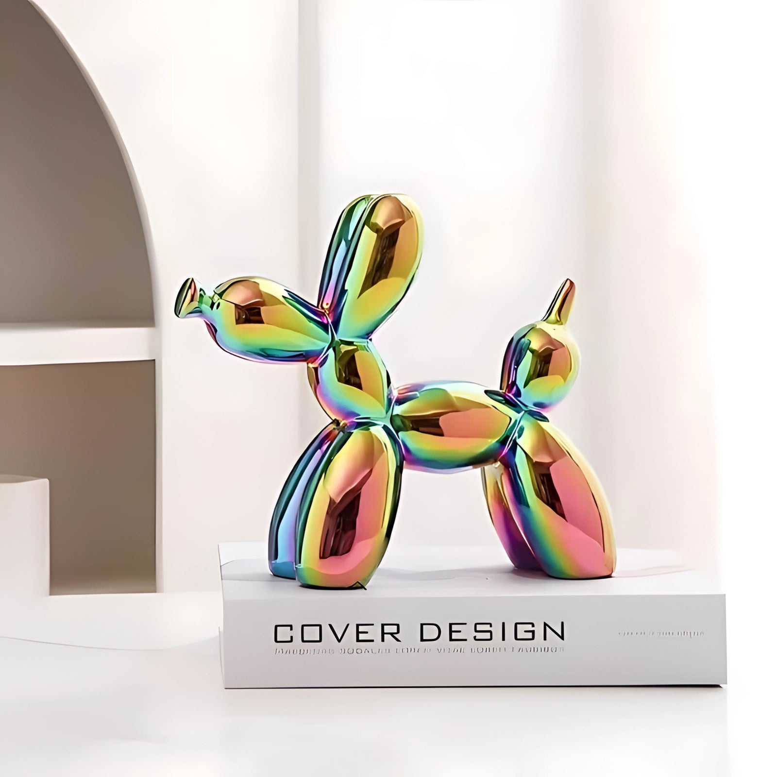 Colorful metallic balloon dog sculpture featuring a modern art design with a luxury accent. The sculpture has a reflective surface with a combination of vibrant hues, creating an eye-catching centerpiece for contemporary decor.