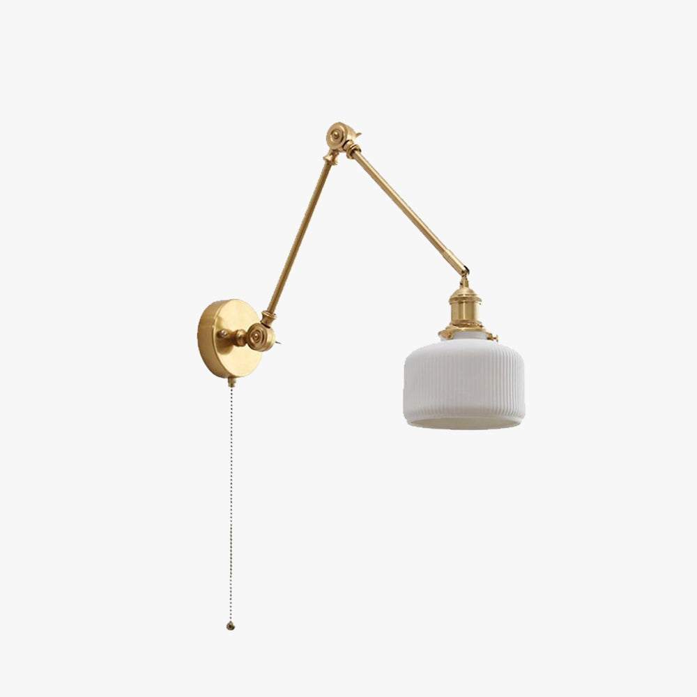 Mid-century adjustable brass wall sconce featuring a vintage design with a metal finish and a circular lamp shade, mounted on a wooden rectangular base.