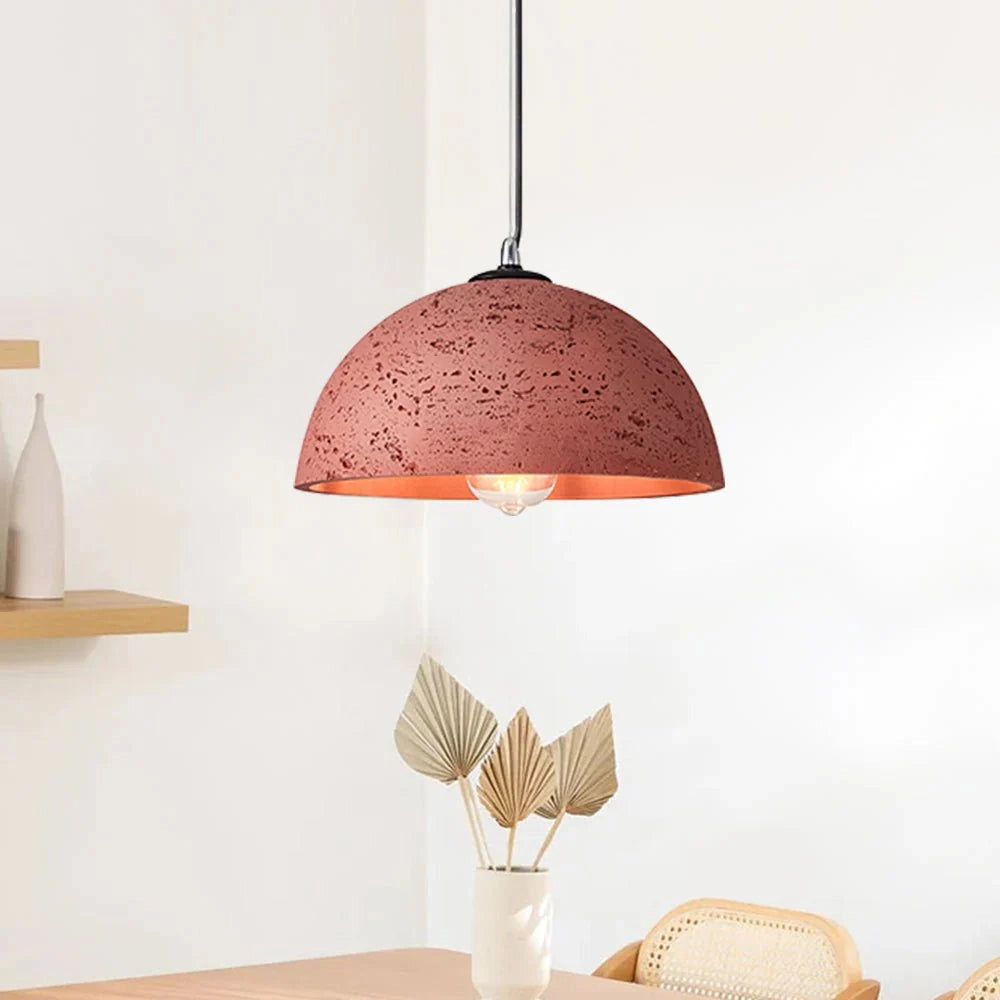 Mid-century minimalist LED pendant light with a red speckled shade, featuring a natural wood accent, hanging from the ceiling.