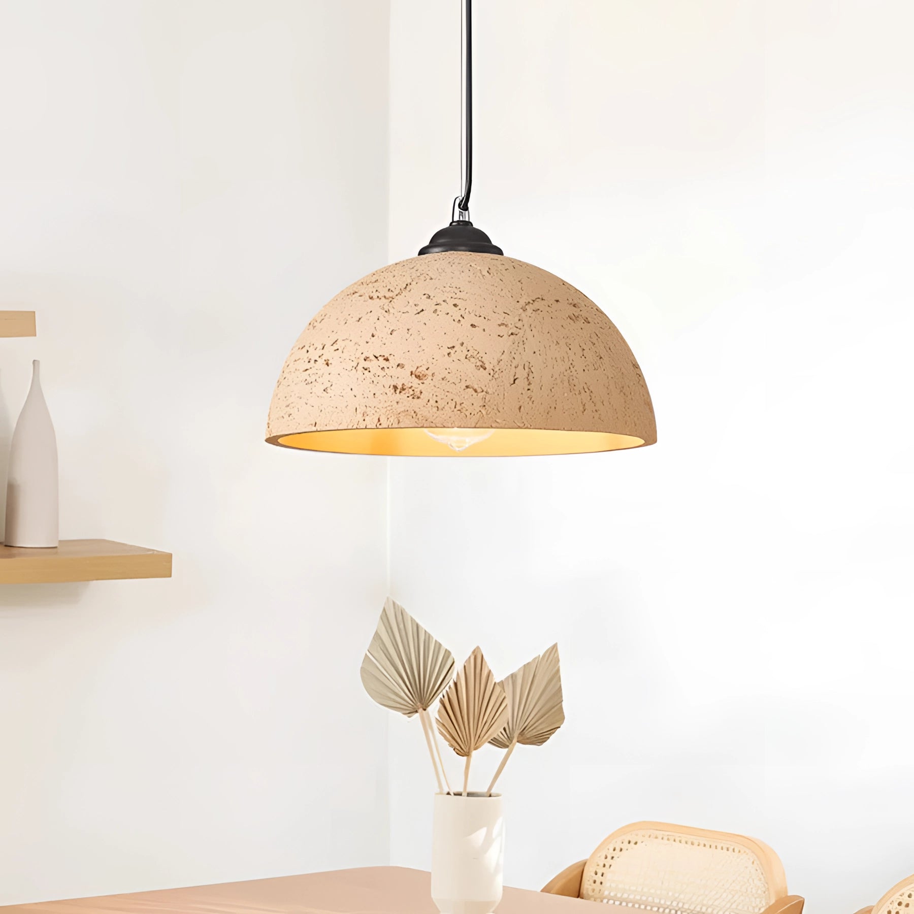 Mid-century minimalist LED pendant light with a speckled beige shade, featuring a natural wood accent and artistic design.