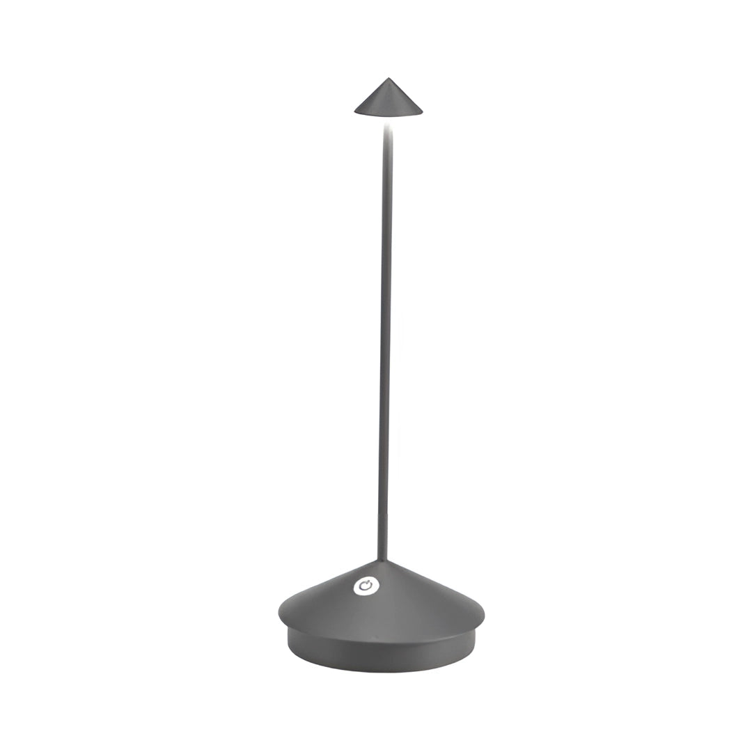 Minimalist arrow-shaped LED desk lamp with a sleek electric blue finish, designed for modern decor; the lamp features a balanced and symmetrical shape, suitable for interior design and complementing contemporary aesthetics.
