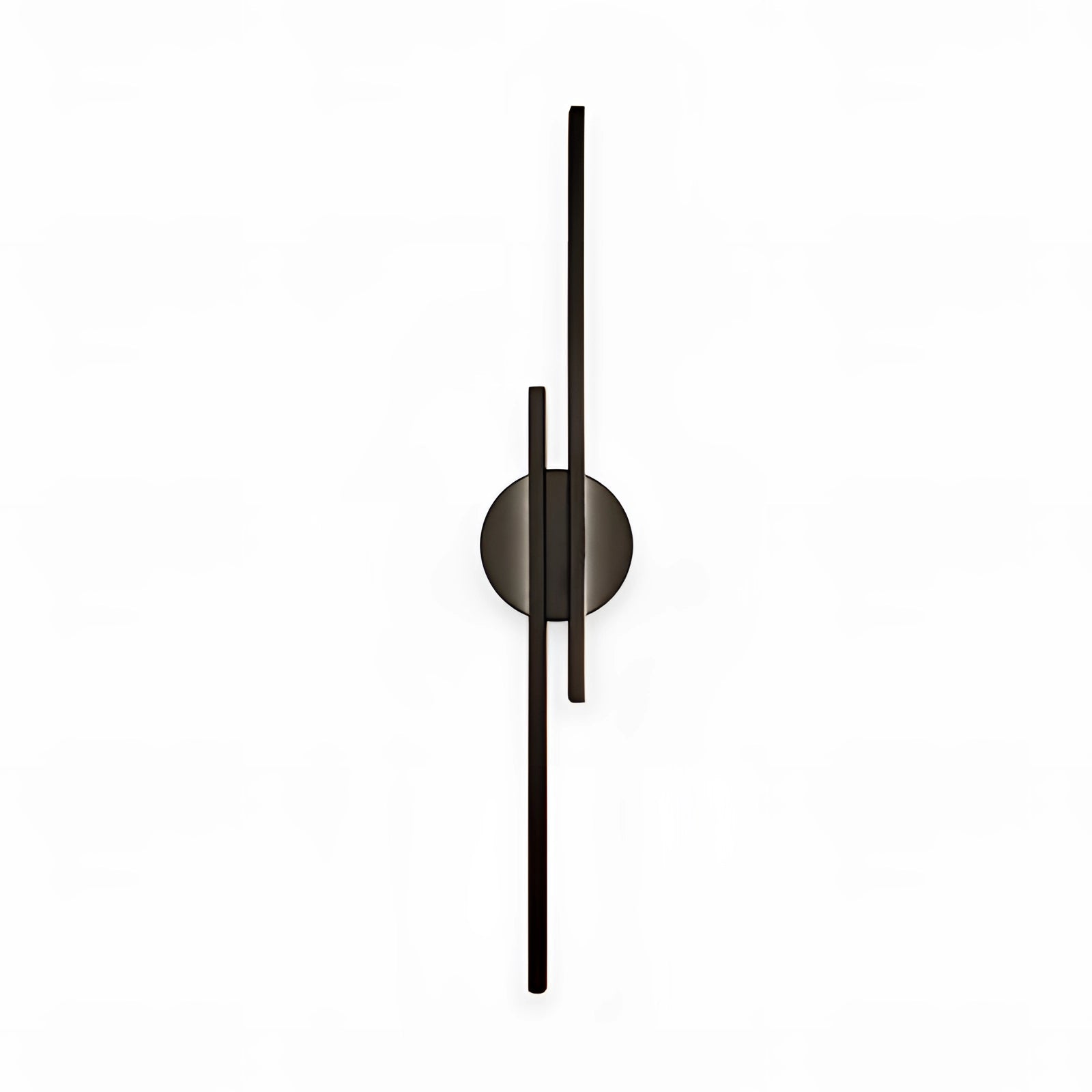 Minimalist black LED wall sconce with a modern vertical metal design, showcased in a still life setting.