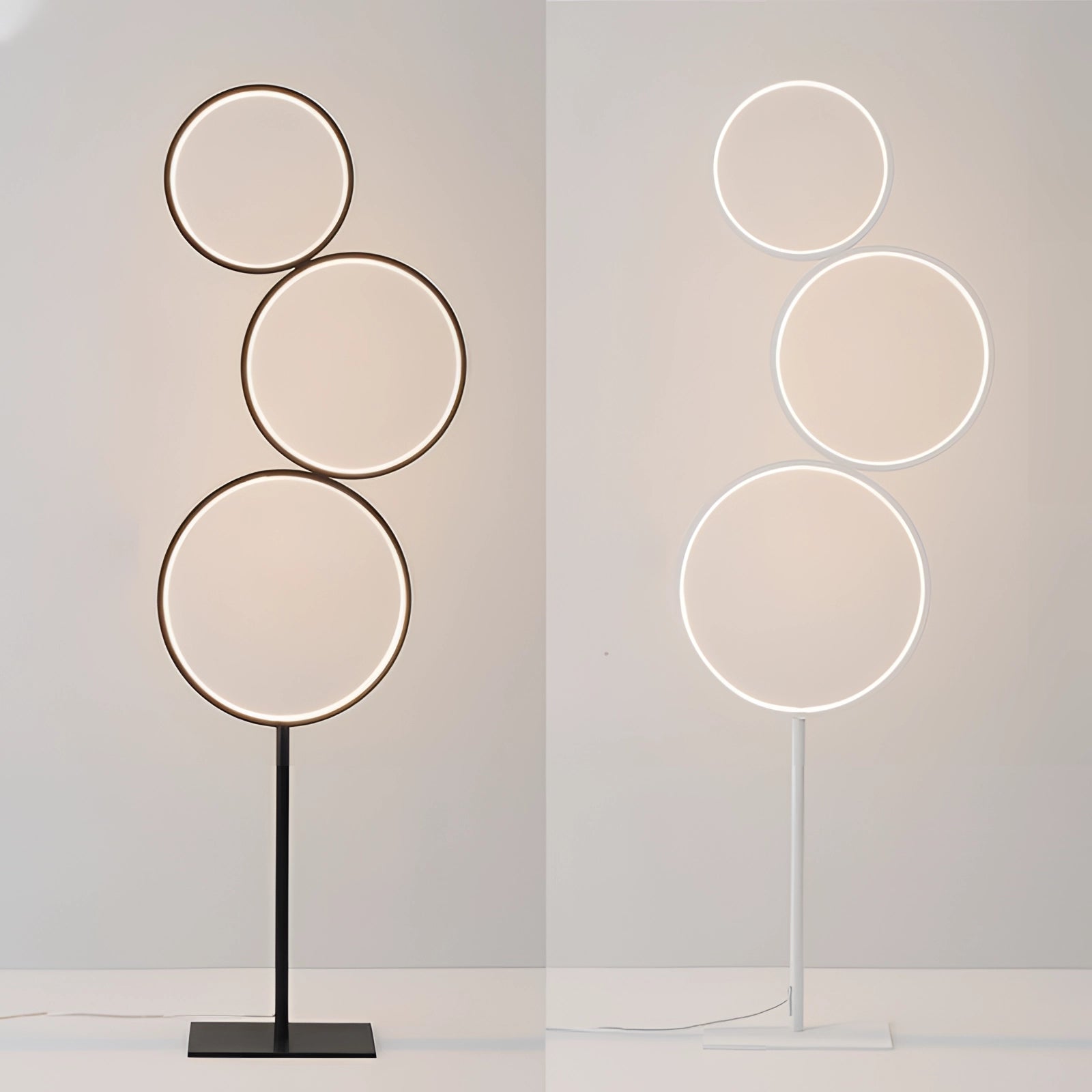 Minimalist black metal circular wall rack with a modern geometric frame featuring a combination of circular and rectangular shapes, showcasing a symmetrical and artistic pattern.