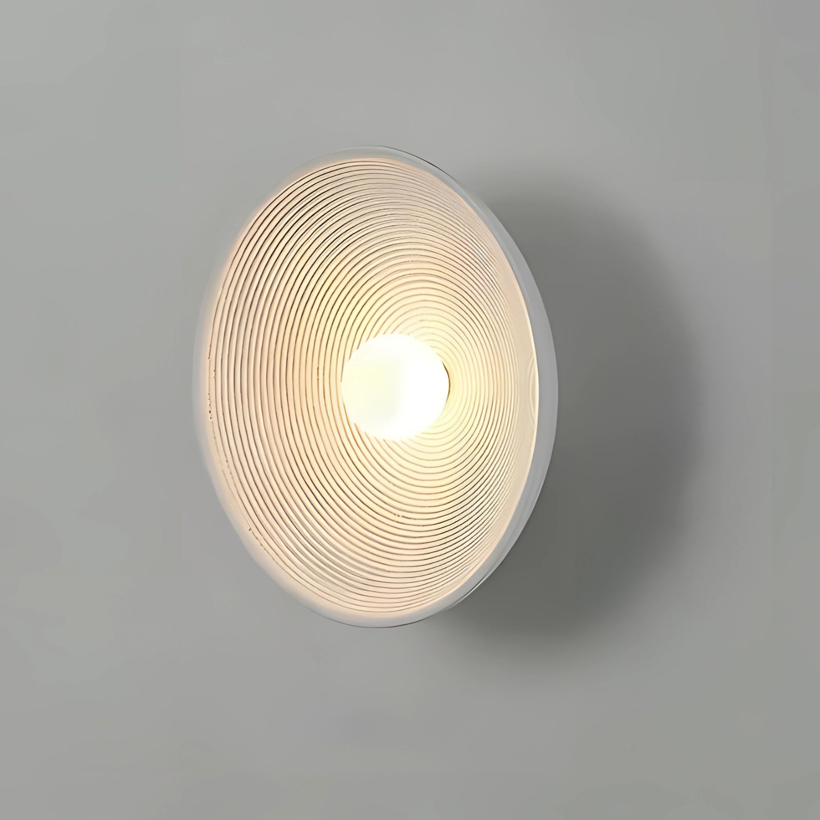 Minimalist bronze circular wall art featuring luxury metallic sculptures with a white and cool white color palette, showcasing intricate patterns and a sophisticated circular design.