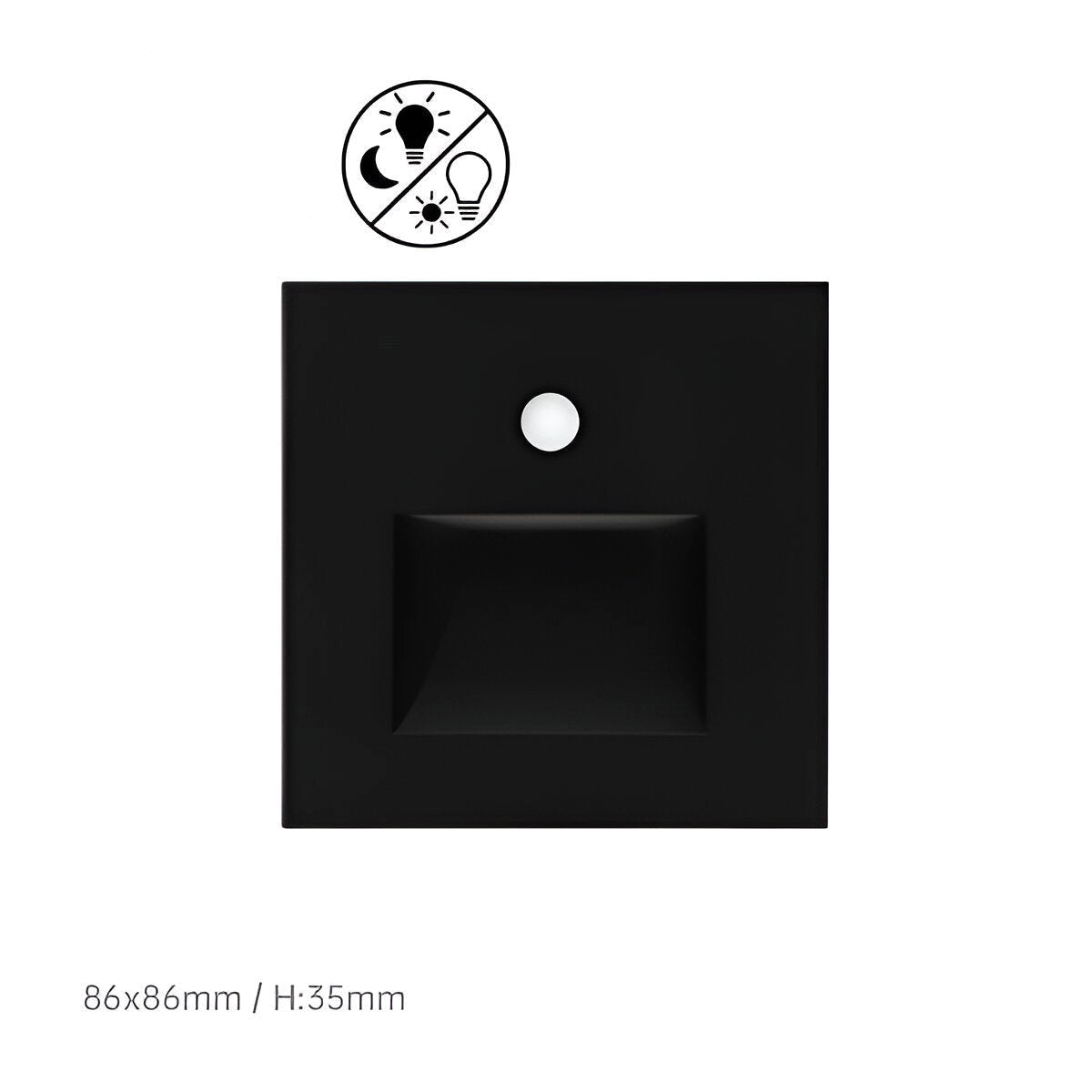 Minimalist child-safety light switch cover in black, measuring 86x86mm, featuring a sleek rectangular design with a sensor for enhanced safety, captured in monochrome.