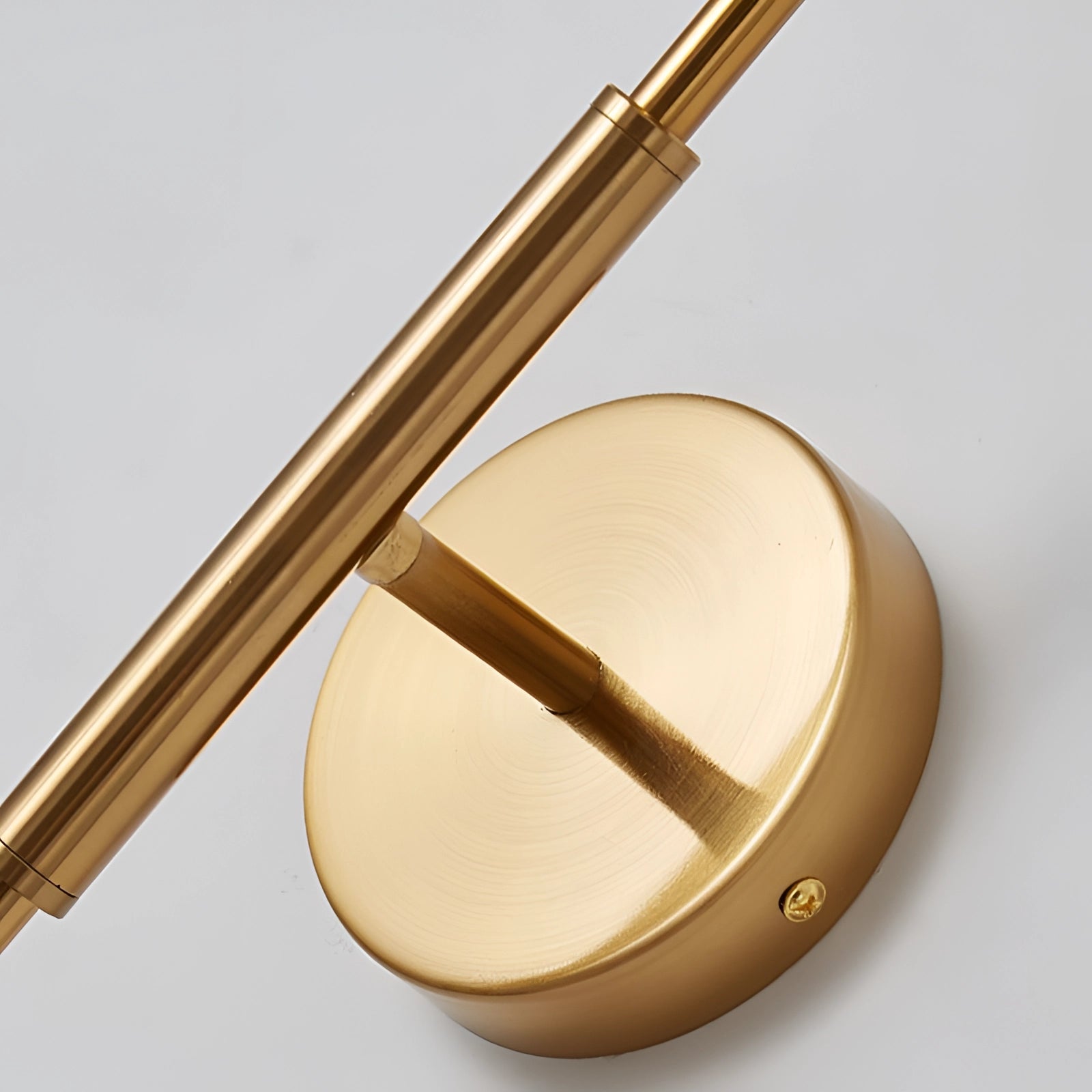 Minimalist Circular LED Wall Lamp in Gold and Black, featuring a modern sconce design with a circular shape, combining metal and wood elements for a sleek, contemporary look.
