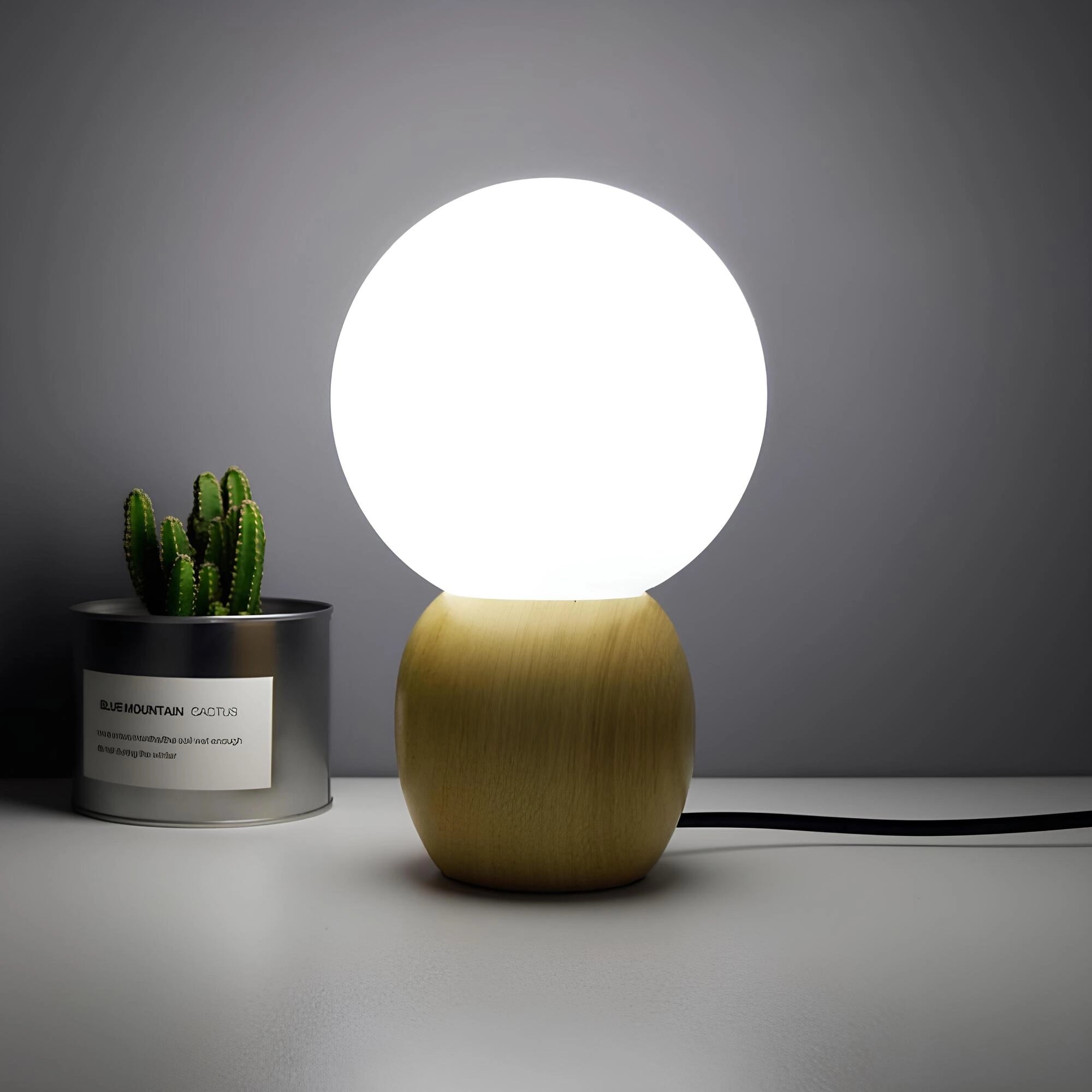 Minimalist glowing bedside lamp with a wooden base, emitting soft ambient light, placed next to a small plant in a vase.