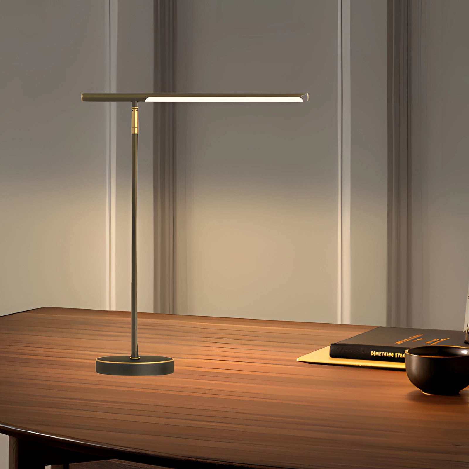 Minimalist gold LED desk lamp with an adjustable arm placed on a wooden table, showcasing its sleek and modern design.