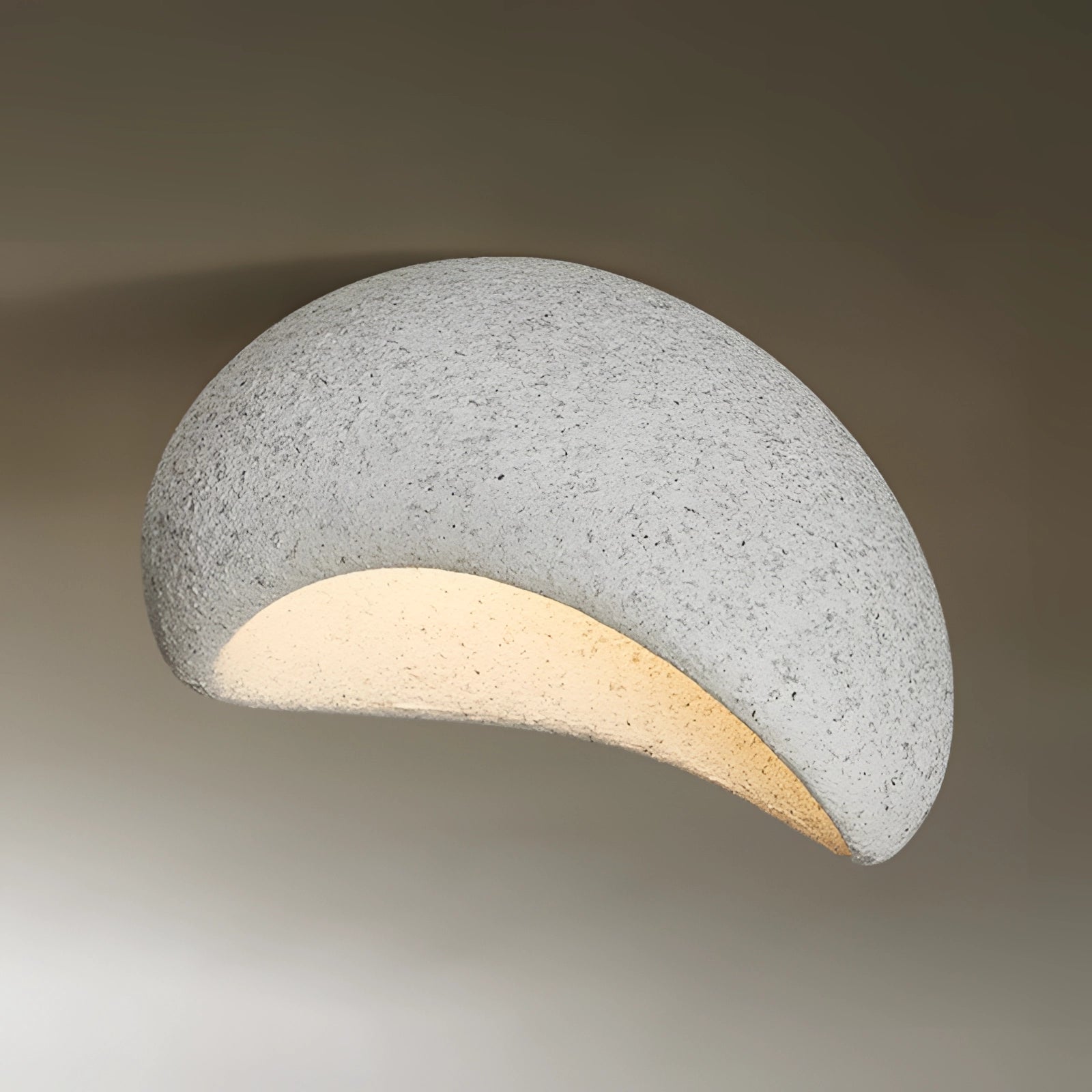 Minimalist Half-Moon Wall Sconce in light gray with bevel connection, measuring 23.5 inches, designed for ambient interior lighting, featuring a sleek and contemporary aesthetic.