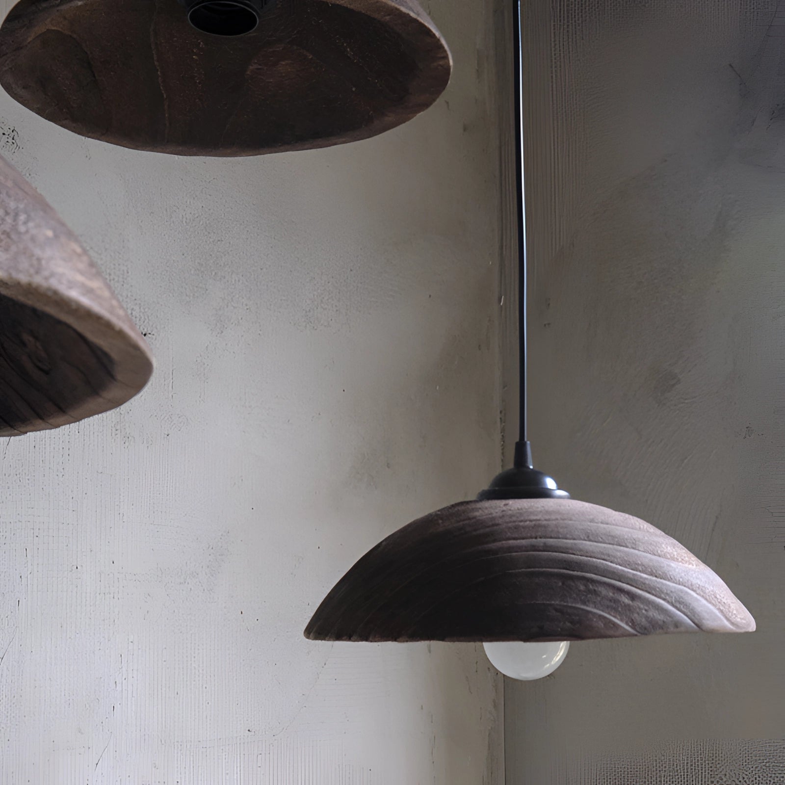 Minimalist Industrial LED Pendant Light with a modern textured design, featuring a circular metal and wood construction in grey, suitable as a ceiling fixture for enhancing contemporary interior spaces.