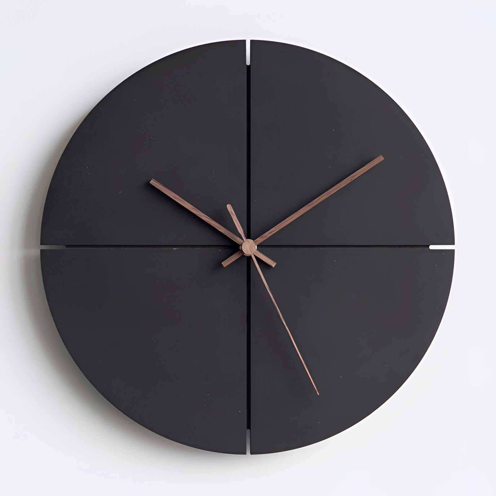 Minimalist large black round wall clock with contemporary split design, featuring a symmetrical layout and clear font, suitable for modern interior decor.