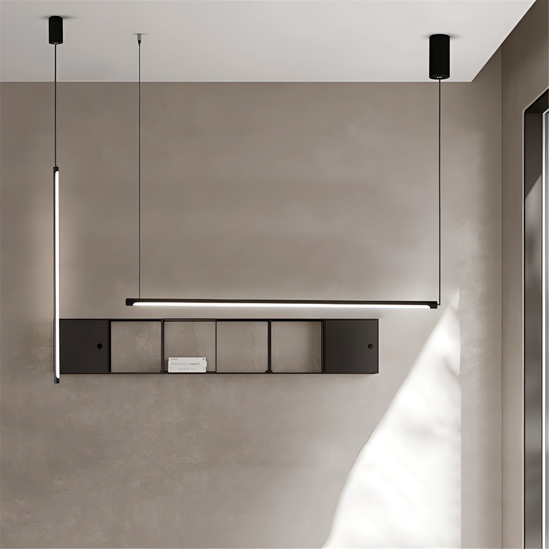 Minimalist LED pendant light with a rectangular design, hanging from the ceiling in a modern luxury dining or kitchen island setting, featuring a sleek metal and glass construction.