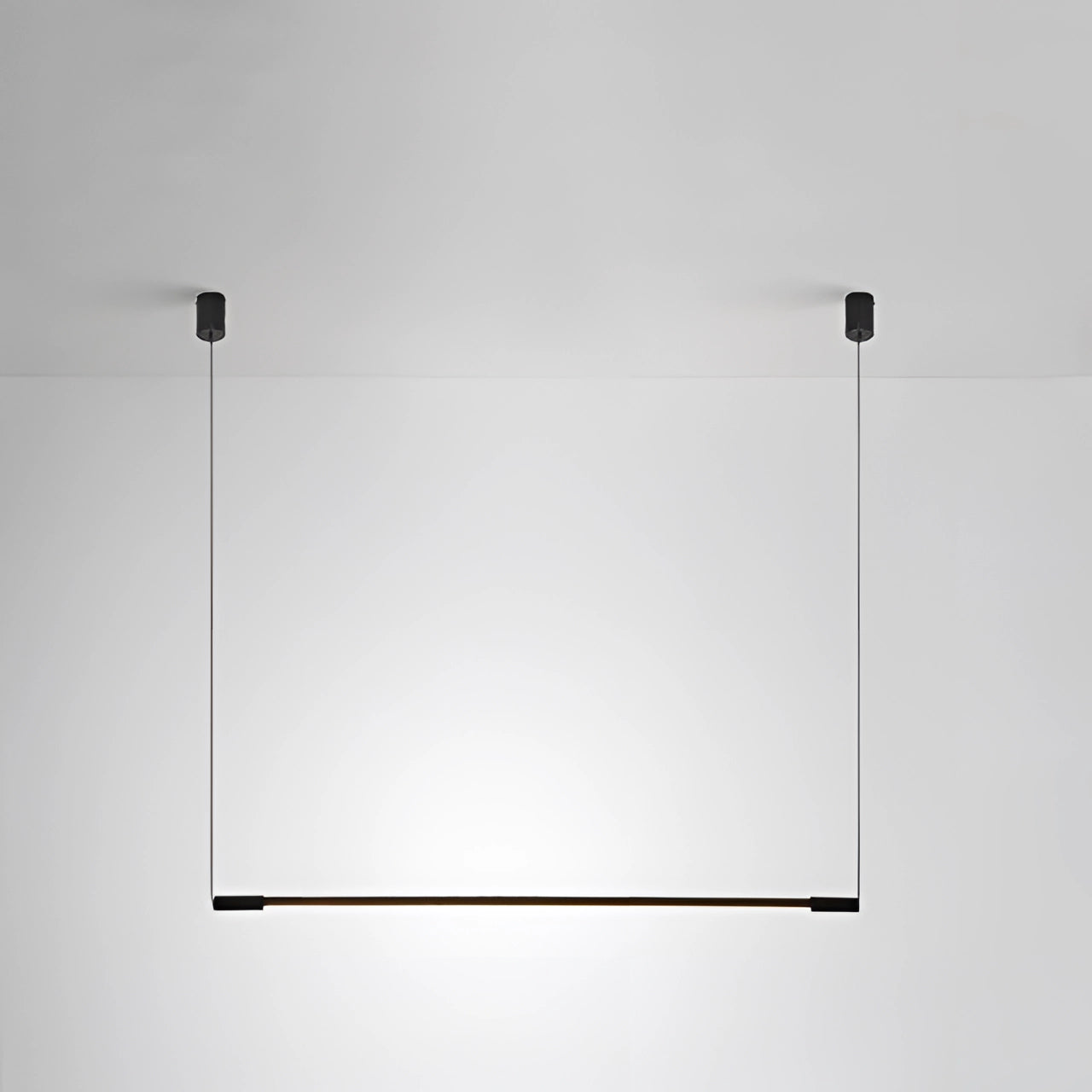Minimalist LED pendant light with a horizontal rectangular design, tri-color lighting, and small size, hanging from the ceiling in a modern kitchen or dining area.