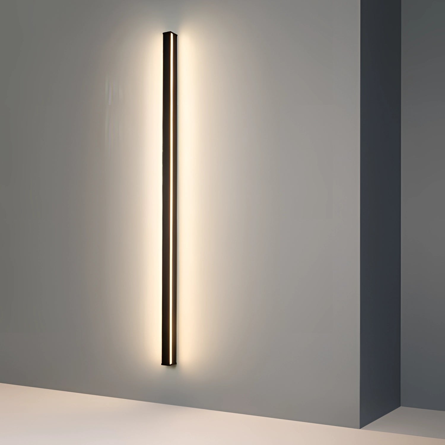 Minimalist LED wall sconce with a modern vertical design, featuring a rectangular shape and a sleek combination of metal and glass materials.