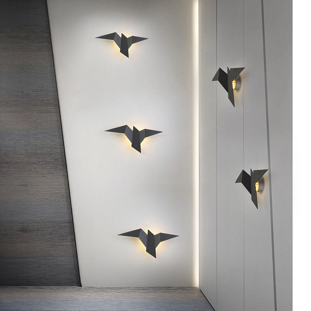 Minimalist origami bird LED wall lamp with a geometric modern design, featuring bird-shaped silhouette and subtle illumination for artistic home decor.