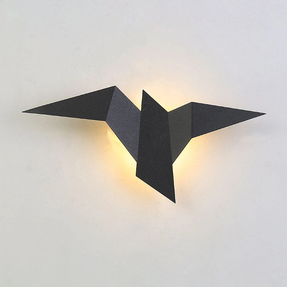 Minimalist origami bird LED wall lamp with geometric modern design, featuring a triangular shape and artistic symmetry, positioned against a wooden backdrop.