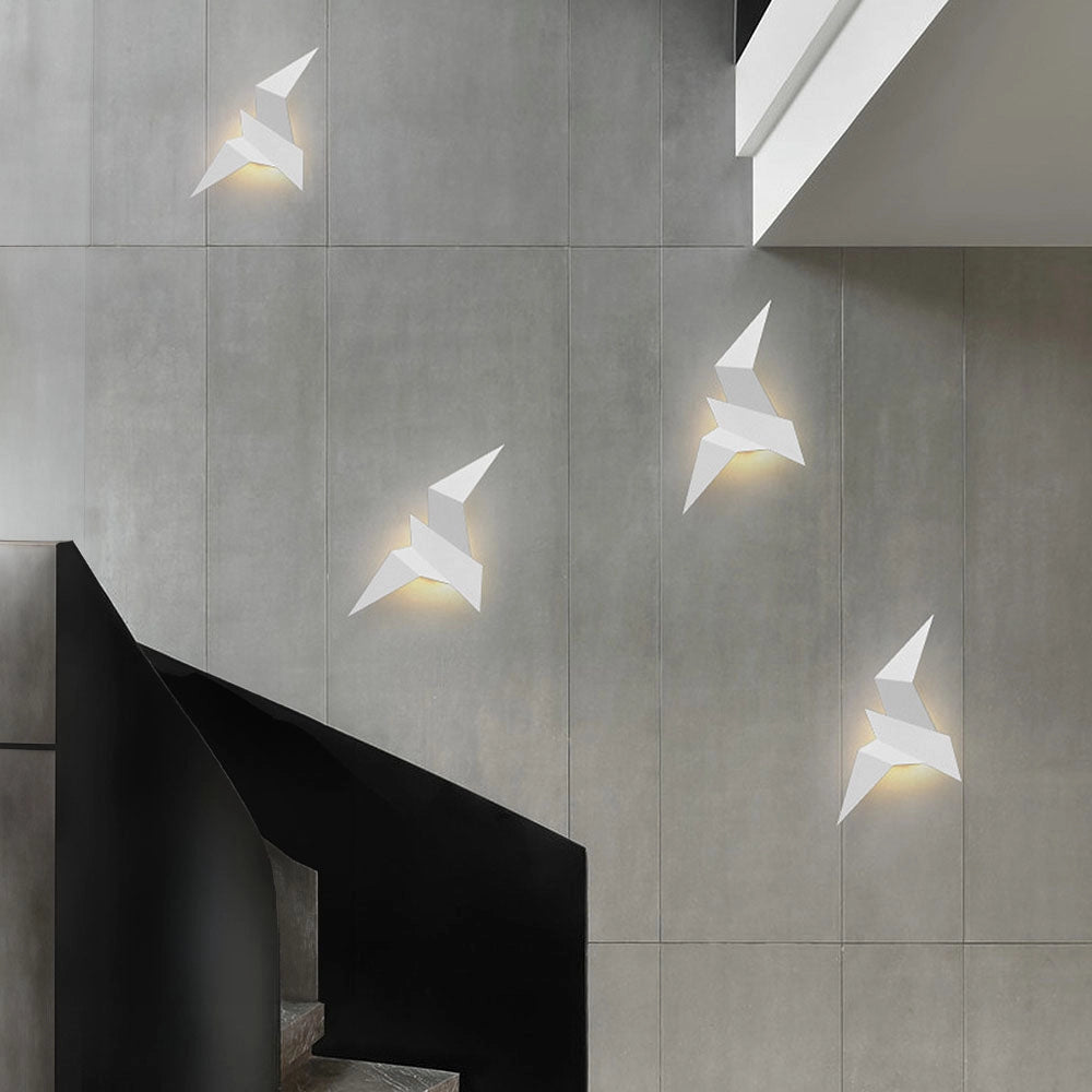 Minimalist Origami Bird LED Wall Lamp in a geometric modern design, featuring a grey rectangular base with wooden accents, mounted on a wall.