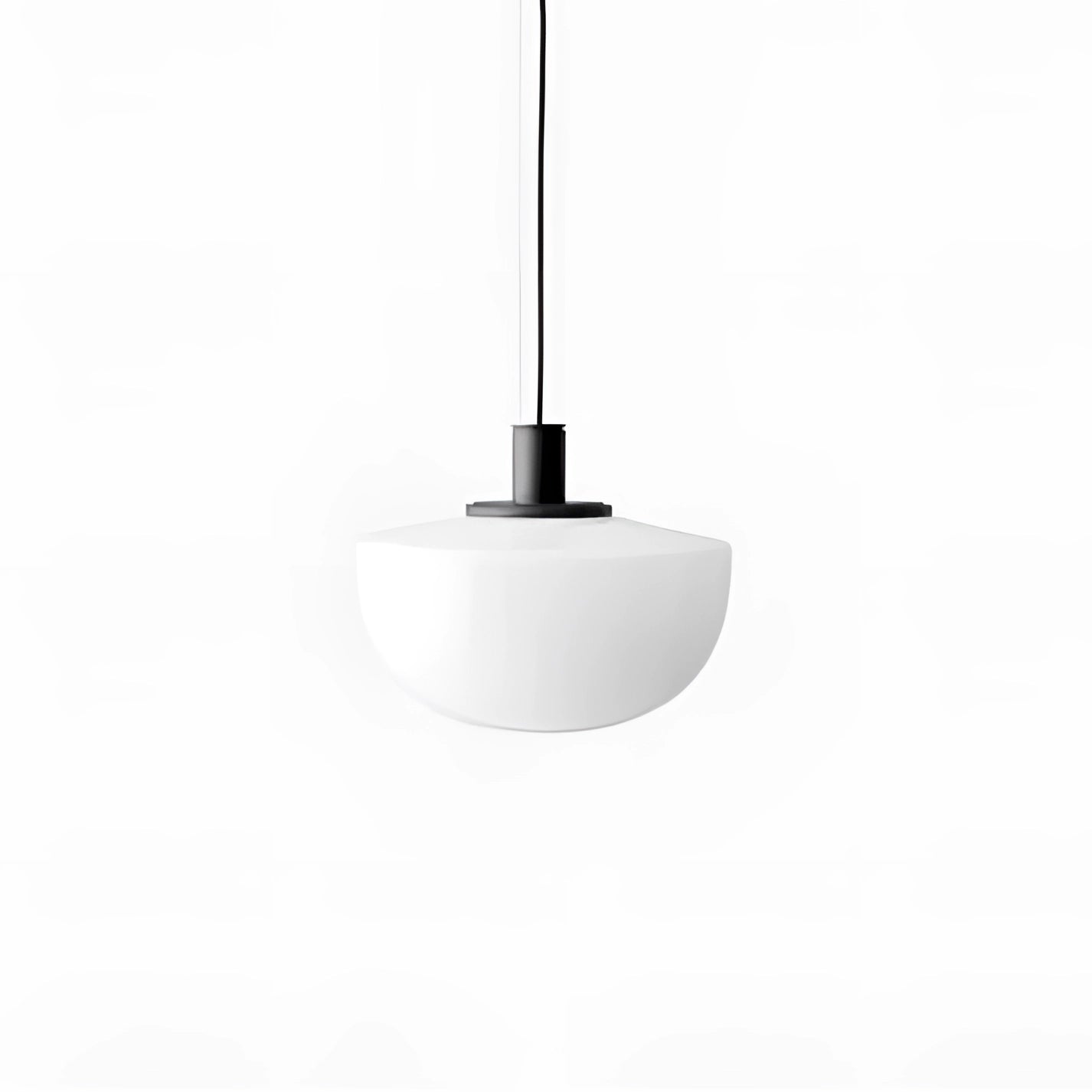 Minimalist pendant light with a modern Scandinavian design, featuring a rectangular metal frame and circular light fixture, installed as a ceiling fixture above a dining room table, highlighting sleek interior design.
