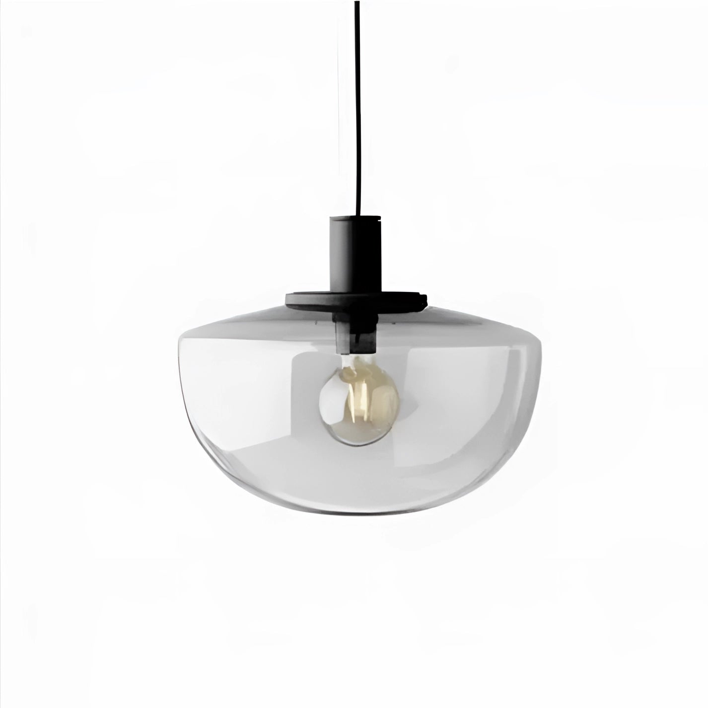 Minimalist pendant light in a modern Scandinavian style with a sleek metal design, featuring a circular nickel finish and suspended from the ceiling, suitable for dining room lighting.
