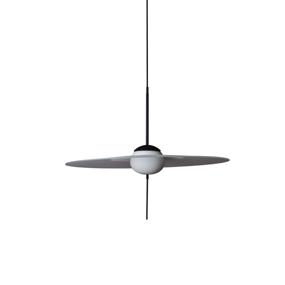 Minimalist round pendant light fixture in titanium finish, featuring a modern and symmetrical design, suspended from the ceiling.