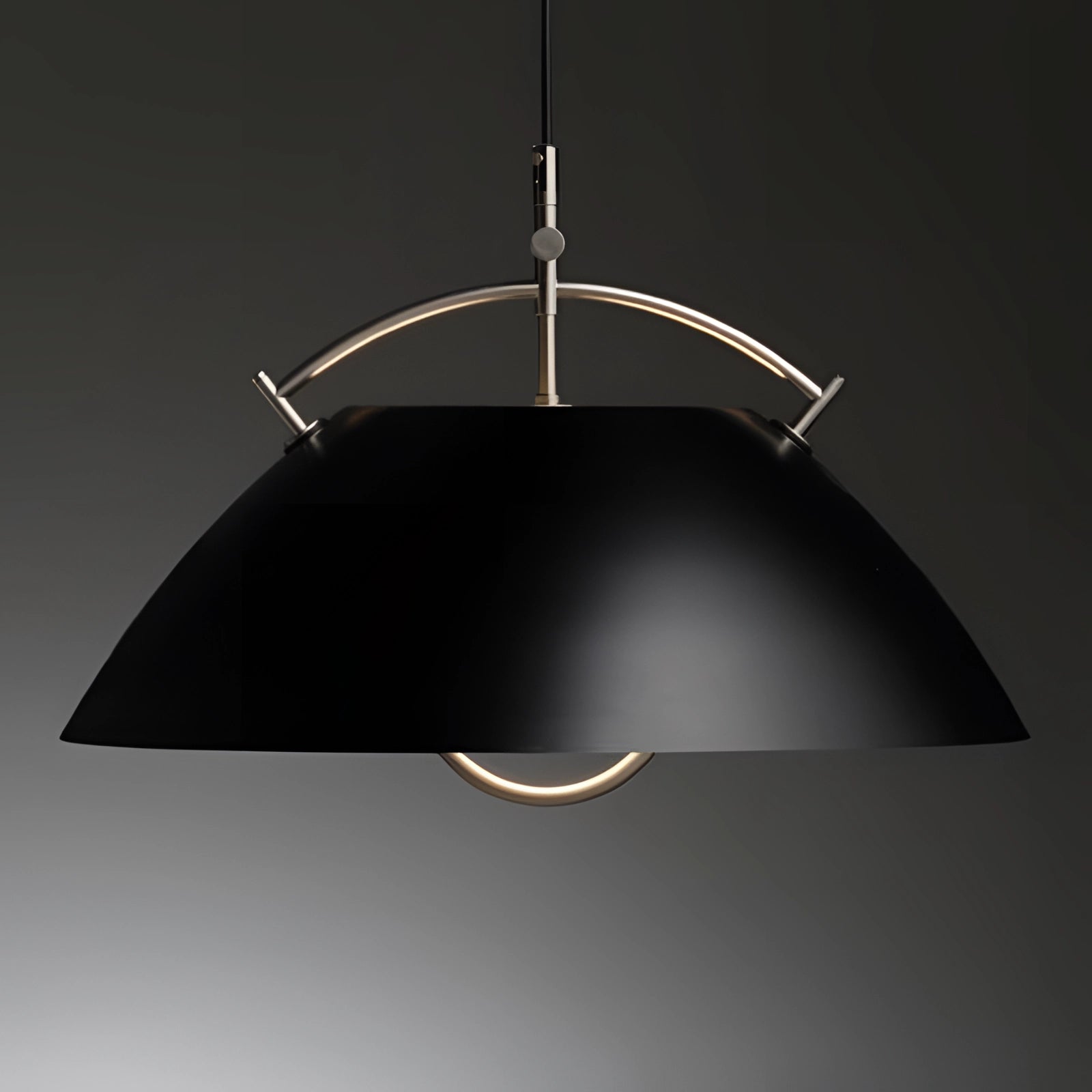 Minimalist Scandinavian white pendant light with a modern, adjustable design, featuring a sleek circular ceiling fixture against a dark background.