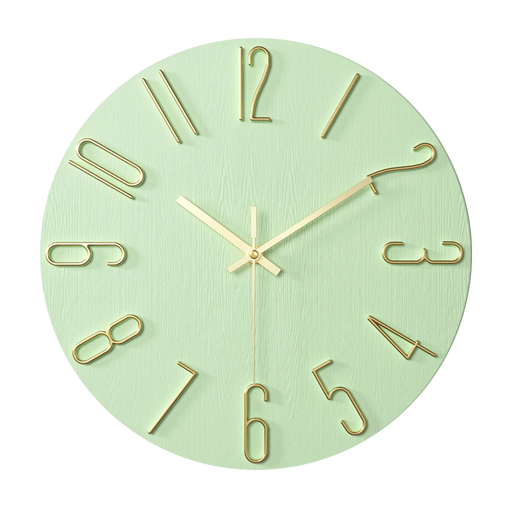 Minimalist soft pink Scandinavian wall clock with modern design, featuring a circular shape, symmetrical layout, and clear numbers, ideal for interior decor.