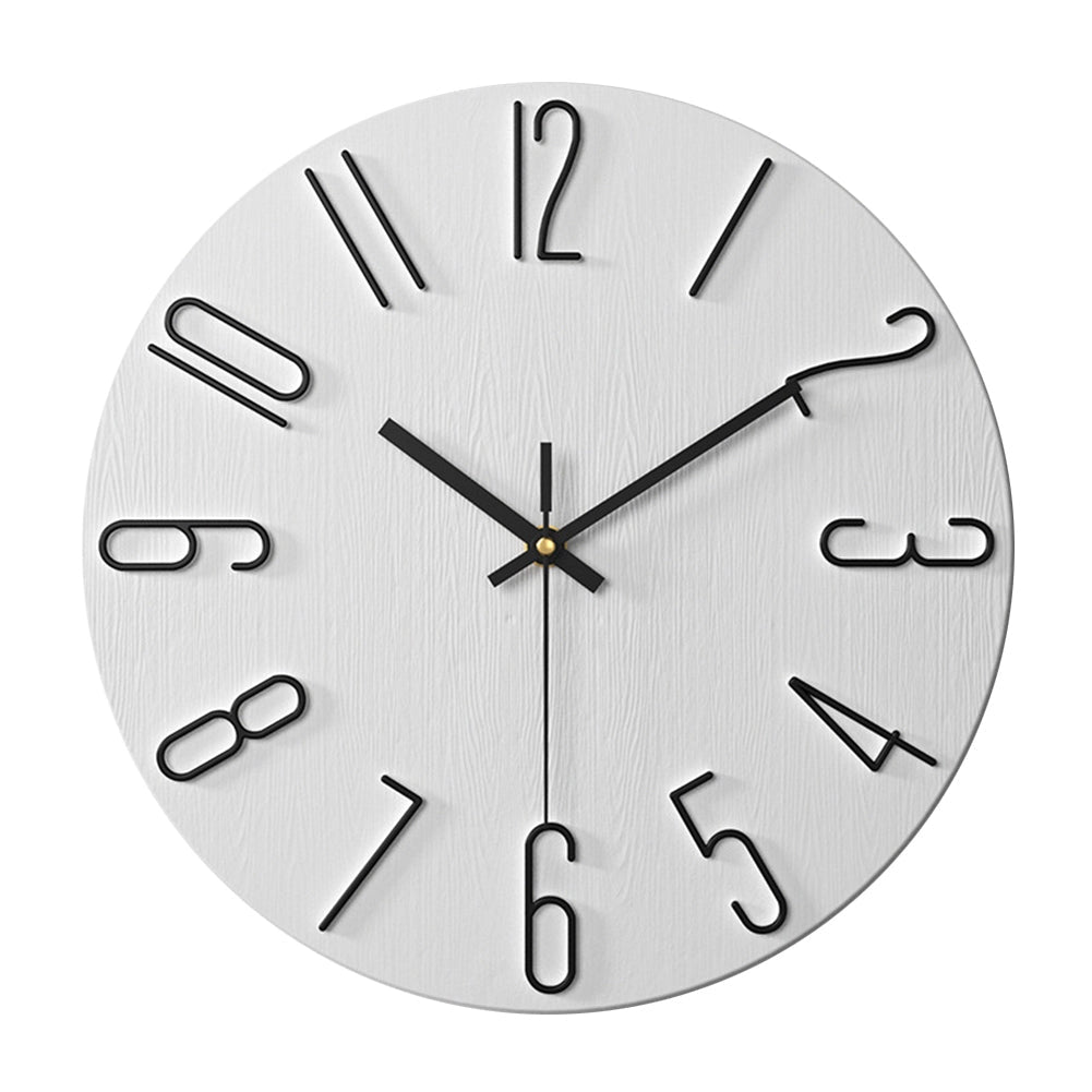 Minimalist soft pink Scandinavian wall clock with a modern design, featuring a circular shape and simple font markings, perfect for contemporary interior decor.