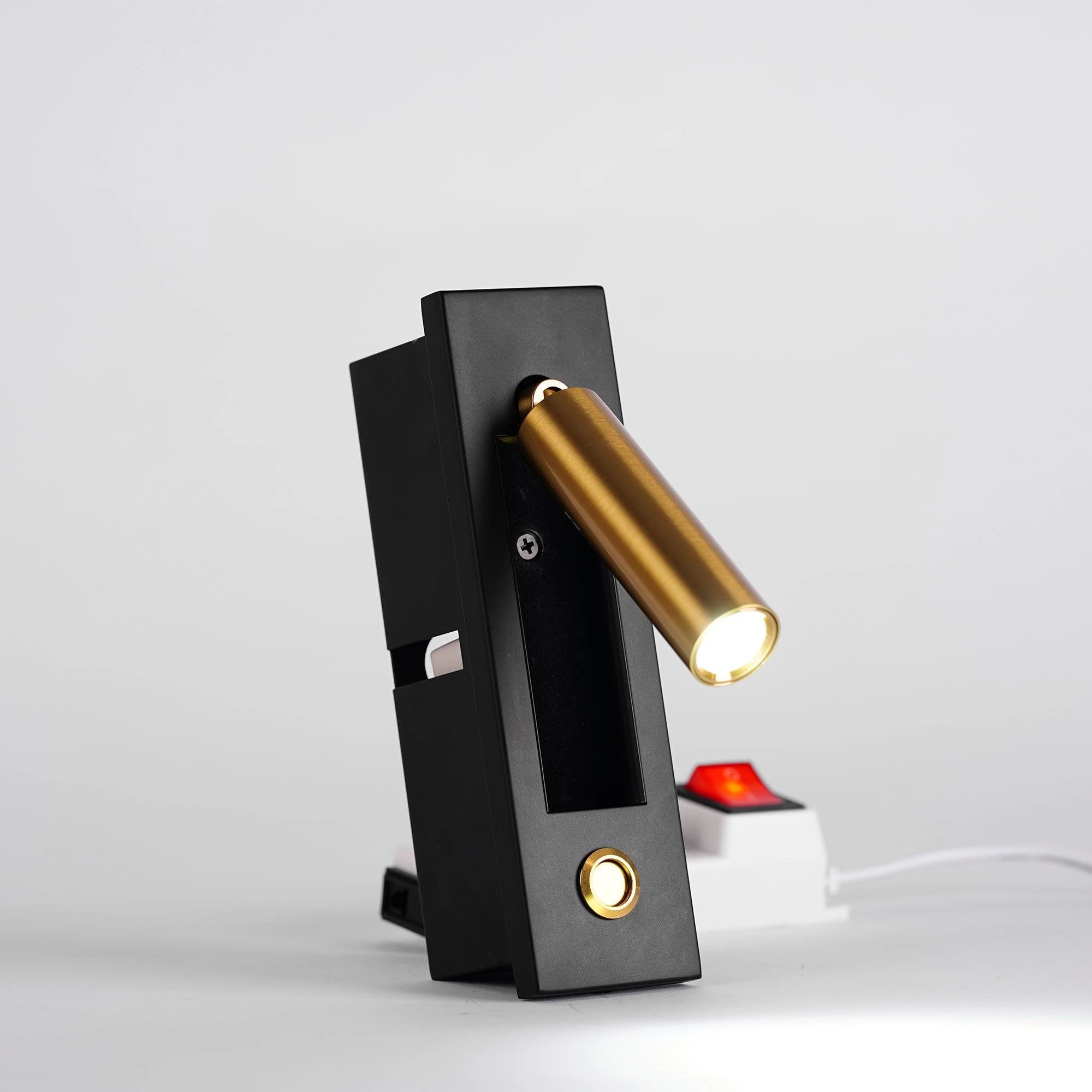 Modern adjustable black LED wall light, weather-resistant with motion sensor, mounted on wall.