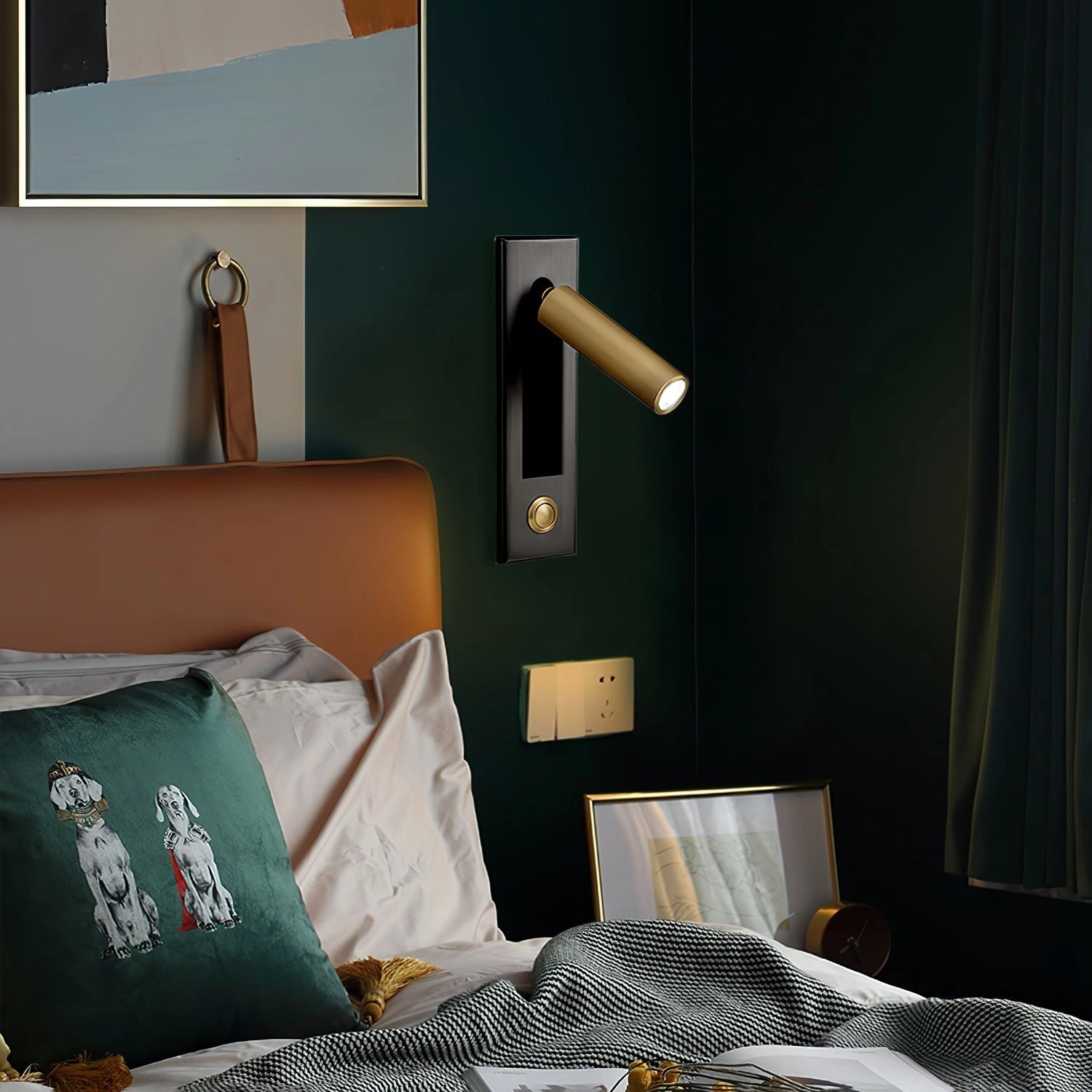 Modern adjustable black LED wall light with motion sensor, installed on an exterior wall.