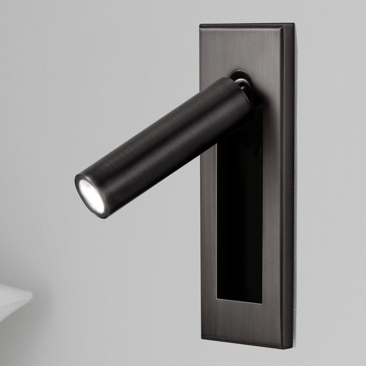 Modern adjustable LED wall light in matte black finish, set of 2 cylindrical shapes, each with dimensions Dia 5cm x H 15.5cm, weather-resistant, featuring a motion sensor, and emitting cool white light.
