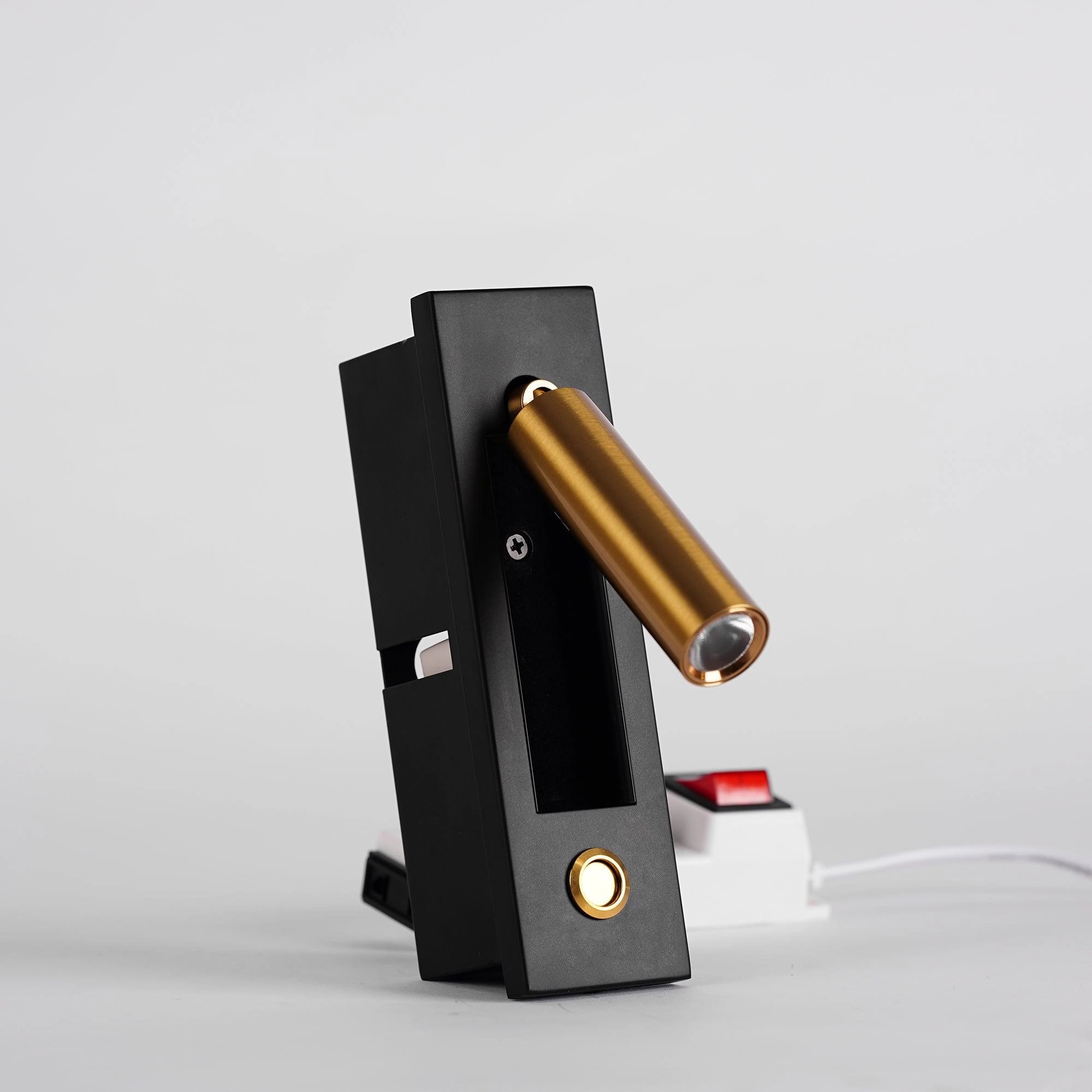 Modern black adjustable LED wall light with motion sensor, featuring a weather-resistant cylindrical design.