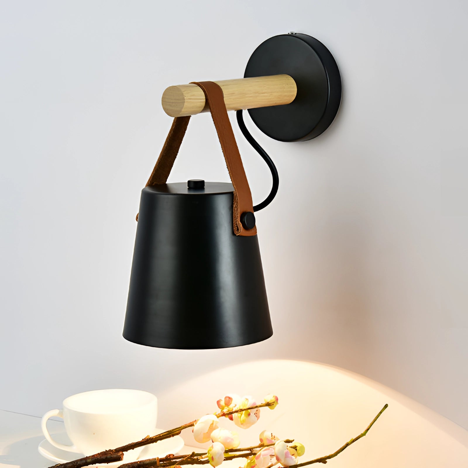 Modern adjustable Scandinavian wooden wall lamp in black with a minimalist design, featuring a wooden arm and metal sconce, ideal for enhancing contemporary interior spaces.