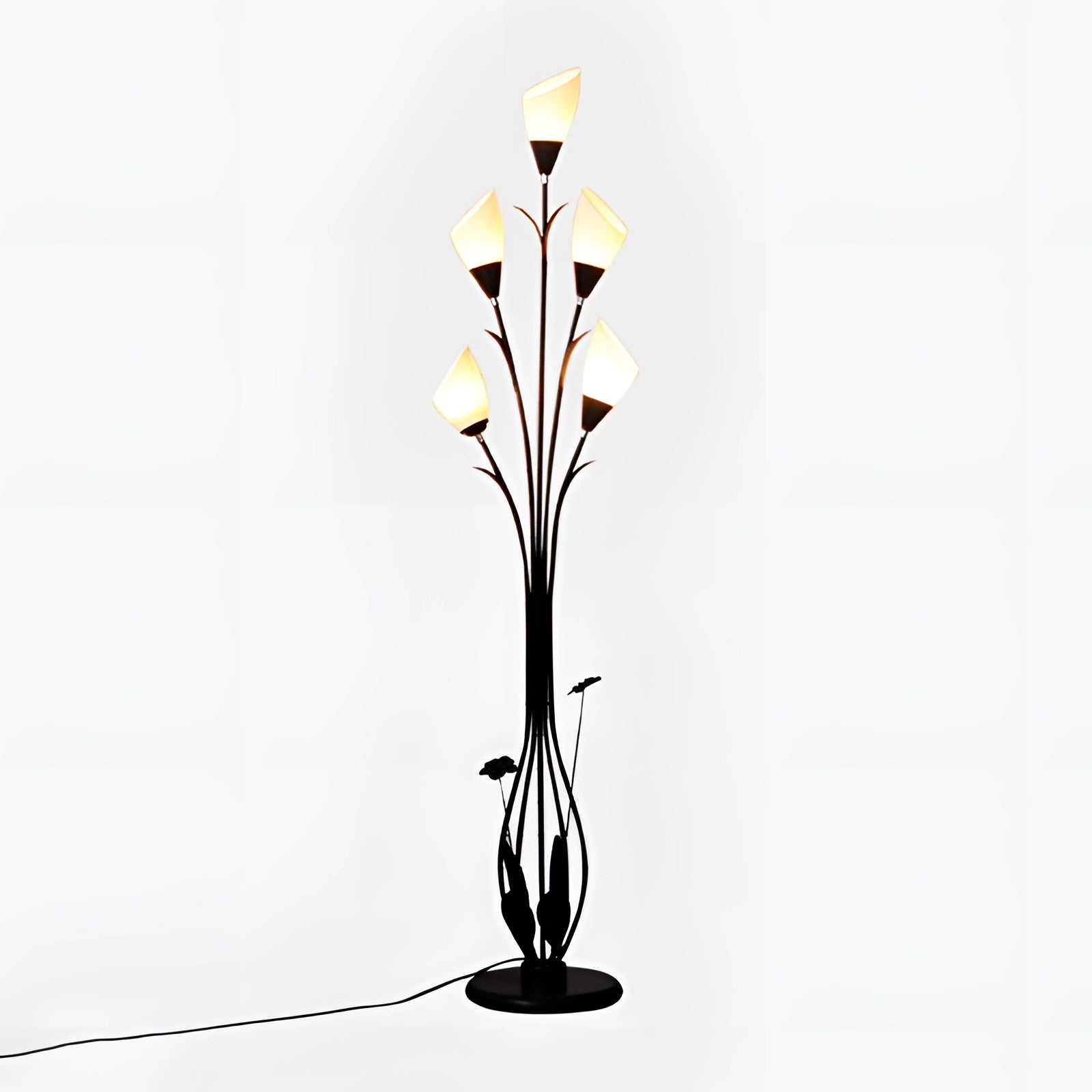 A modern black floral floor lamp elegantly designed with decorative floral patterns, enhancing any room with its artistic and sophisticated appearance.