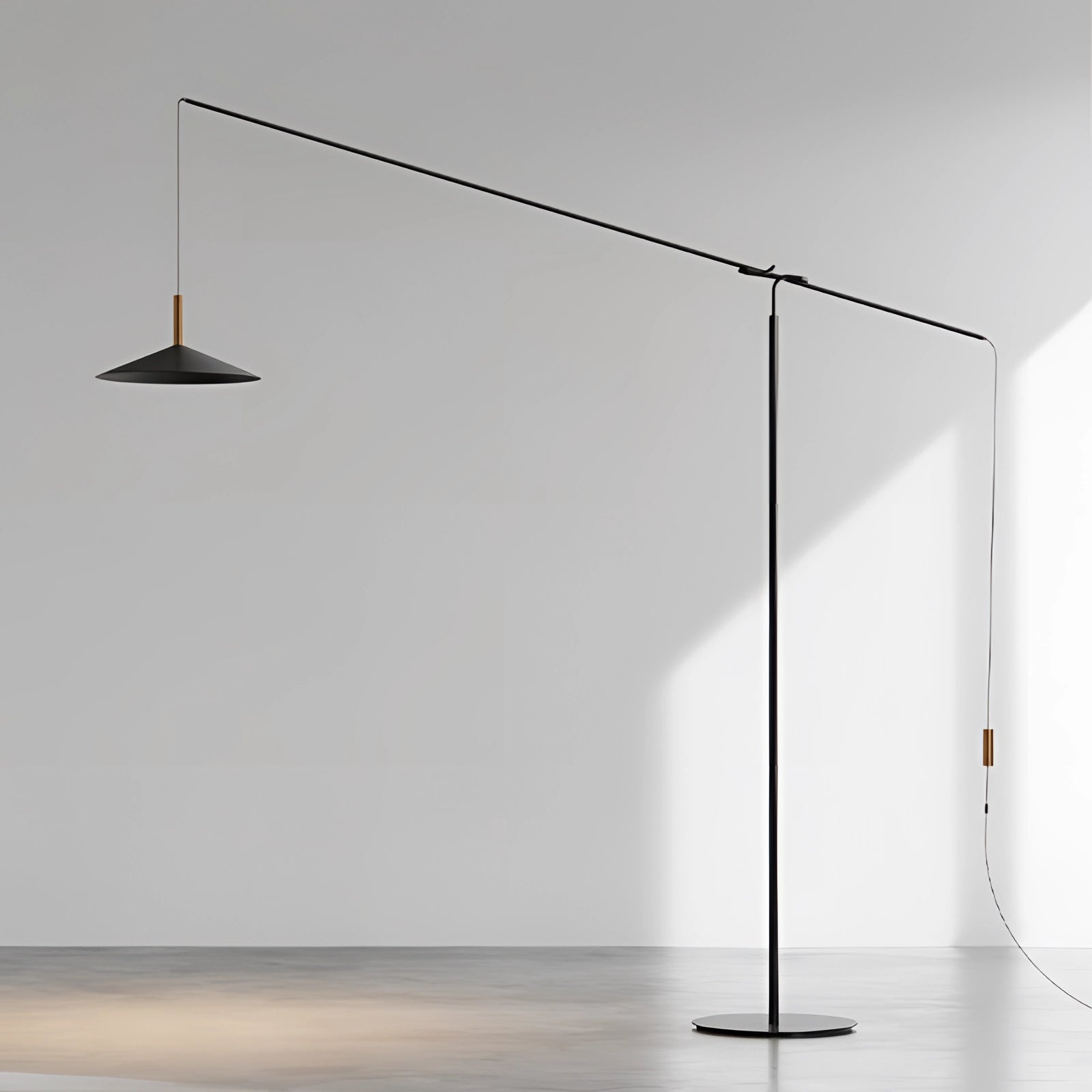 Modern black and gold adjustable designer floor lamp with a sleek and contemporary design, featuring a metal and glass construction, positioned on a rectangular base.