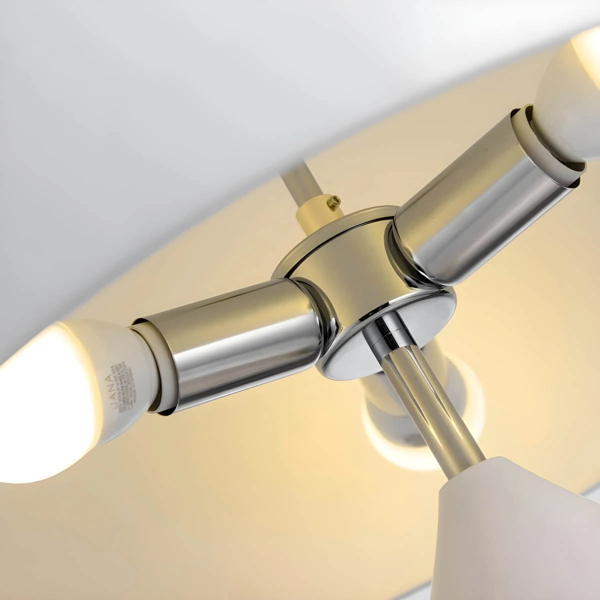 Modern black and gold dome pendant light with a geometric design, made of metal, featuring a sleek cylinder shape.