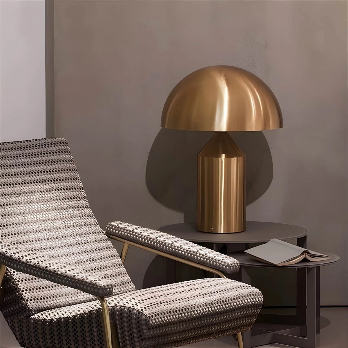 Modern black and gold dome pendant light with geometric design, hanging from a ceiling, featuring a luxurious and contemporary style suitable for desk or decorative use.