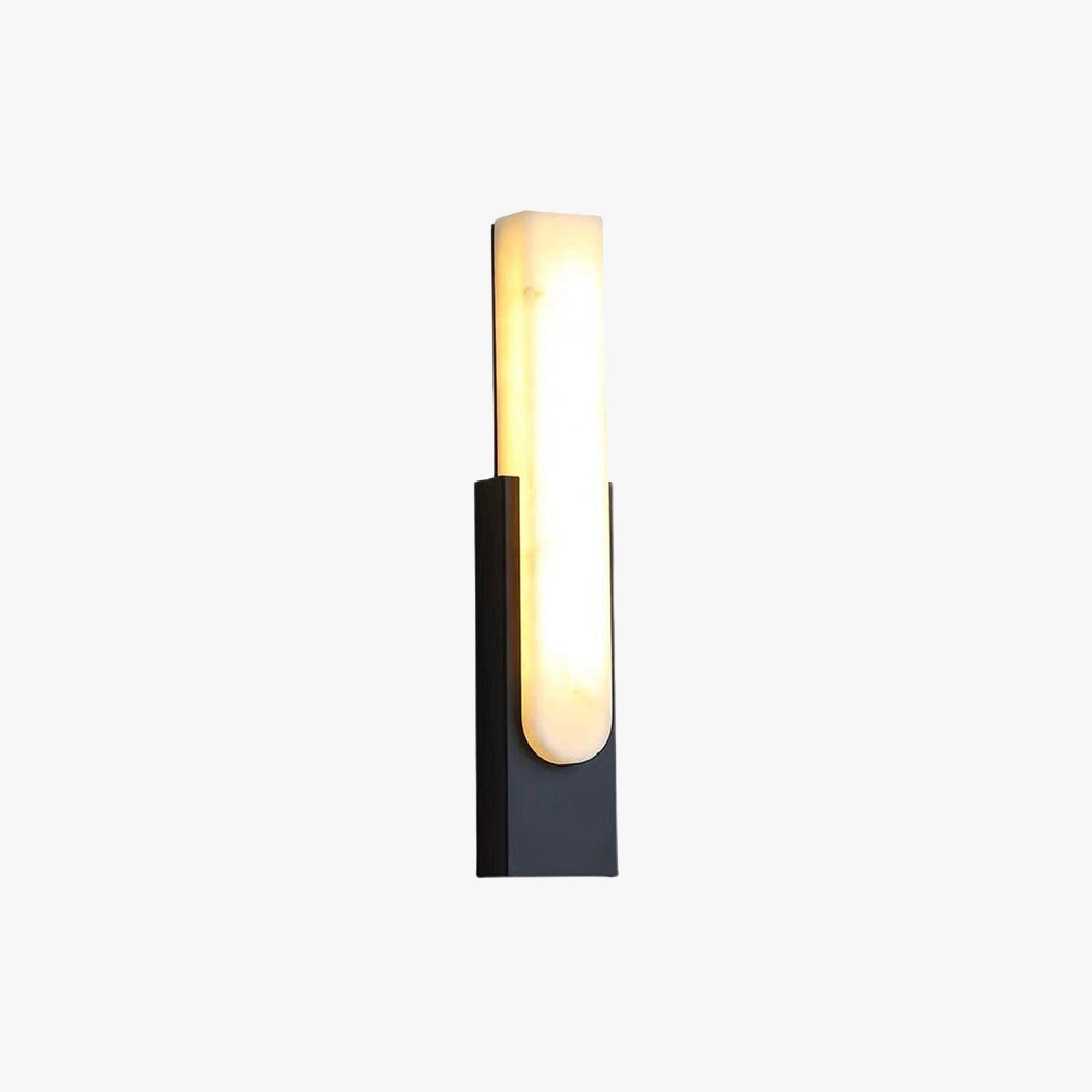 Modern black and gold LED wall sconce with a minimalist design, featuring a rectangular shape and cylindrical elements, suitable for indoor lighting.