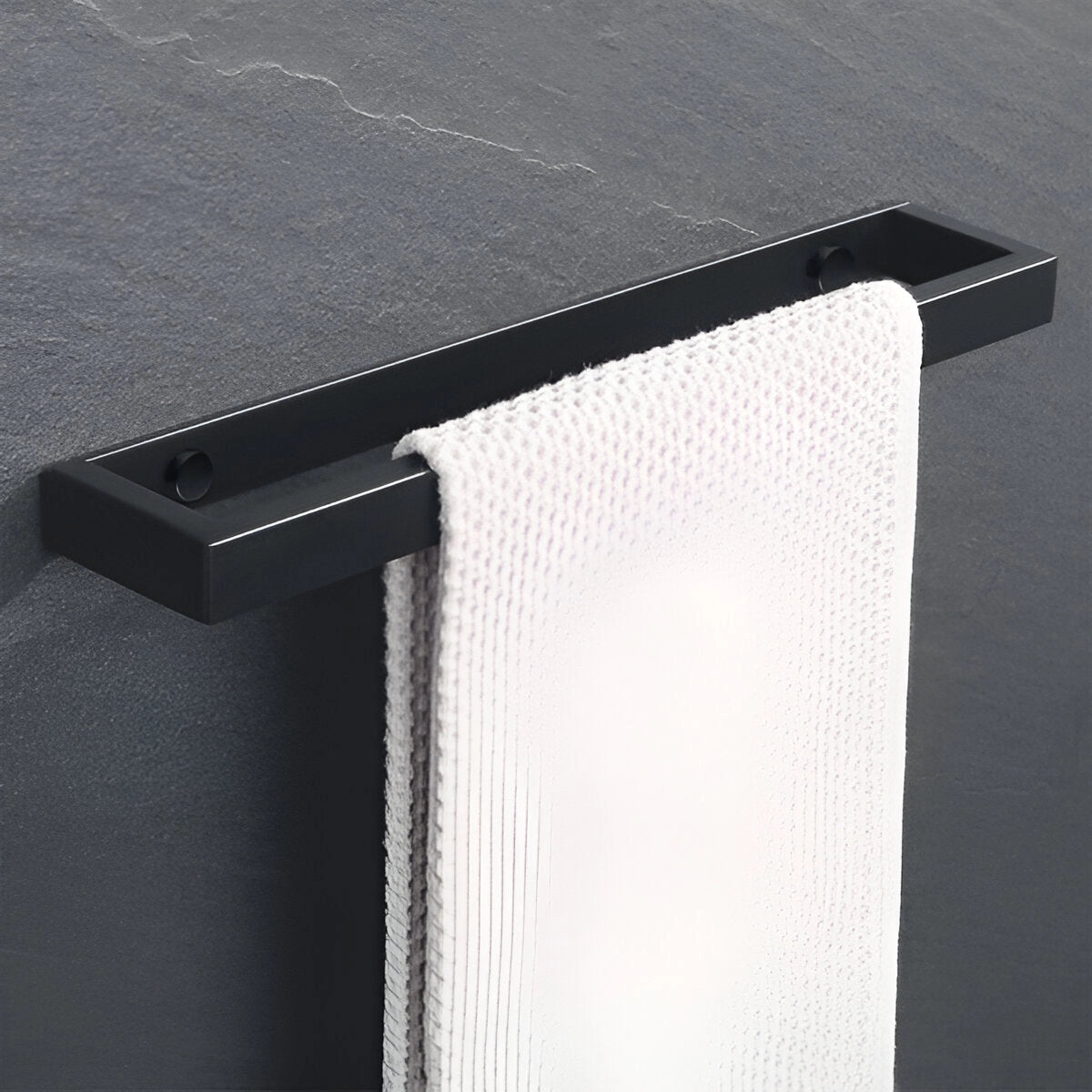 Sleek black wall-mounted towel bar made of durable metal, measuring 40cm, designed to complement modern luxury bathroom decor.