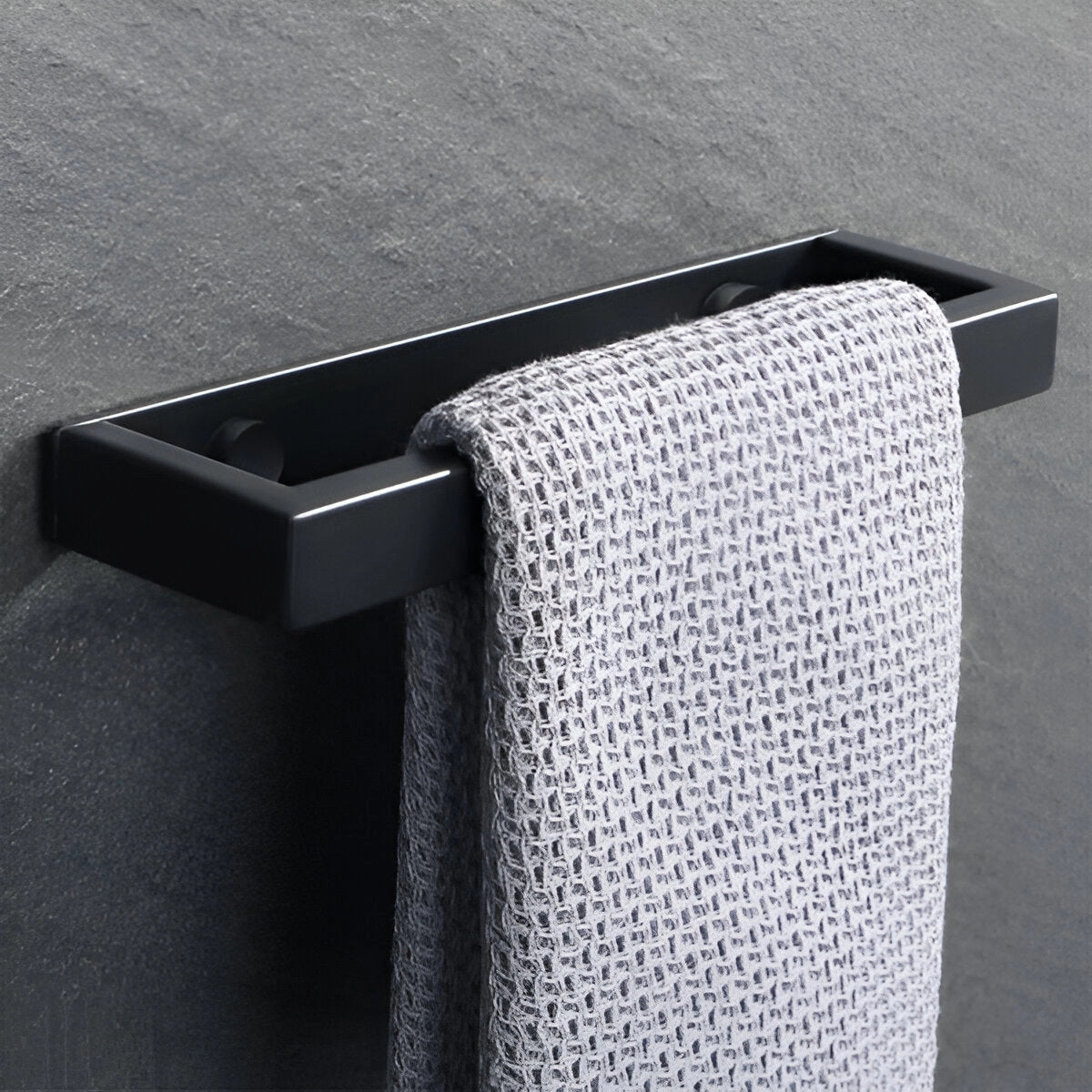 
A sleek 20cm modern black wall-mounted towel bar designed as a luxury bathroom accessory.