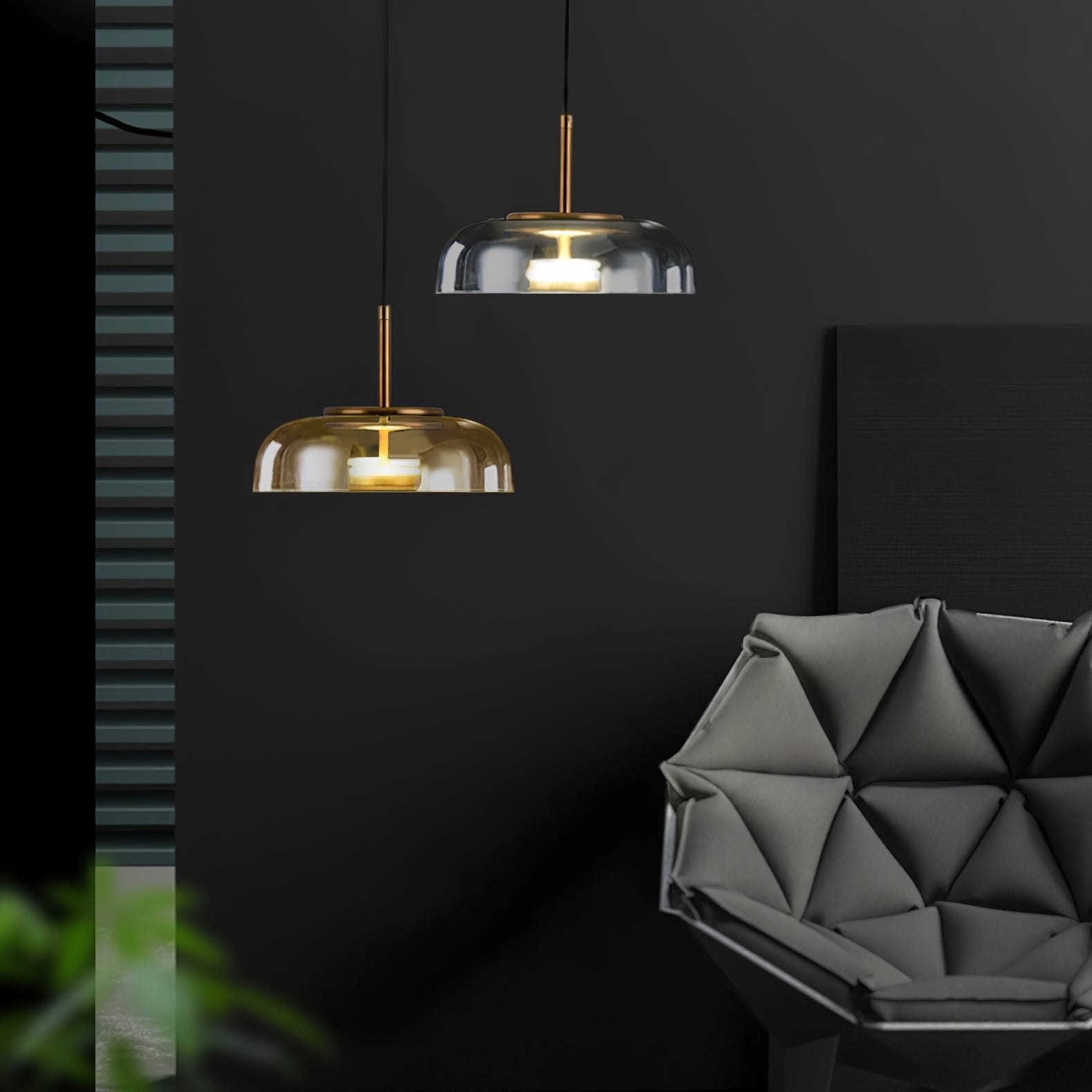 Luxury minimalist modern brass and chrome LED pendant lights hanging from the ceiling, illuminating a stylishly designed interior with a couch.
