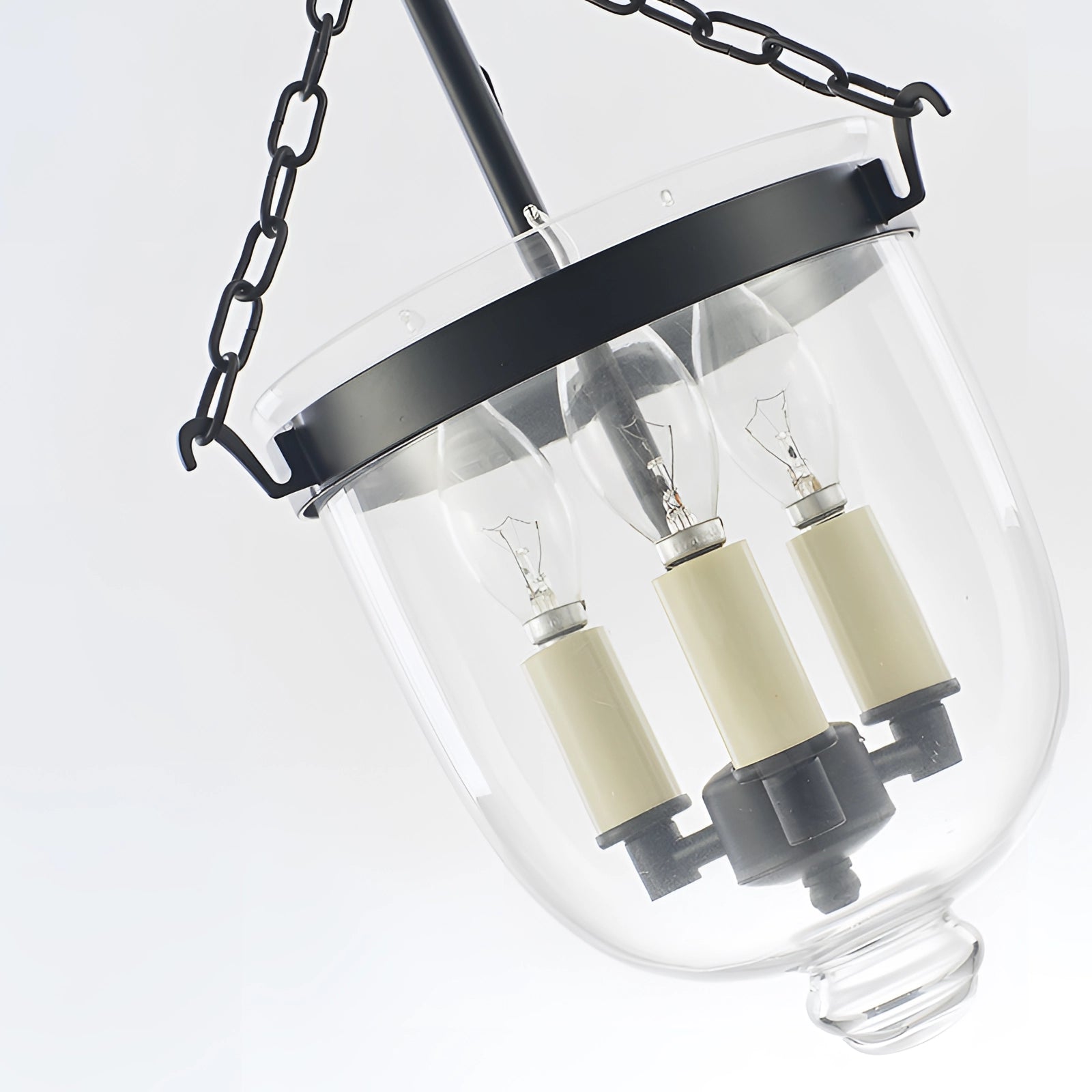 Modern brass glass pendant light with a luxurious design, featuring a sleek brass fixture and glass elements, hanging from the ceiling as an elegant indoor chandelier.