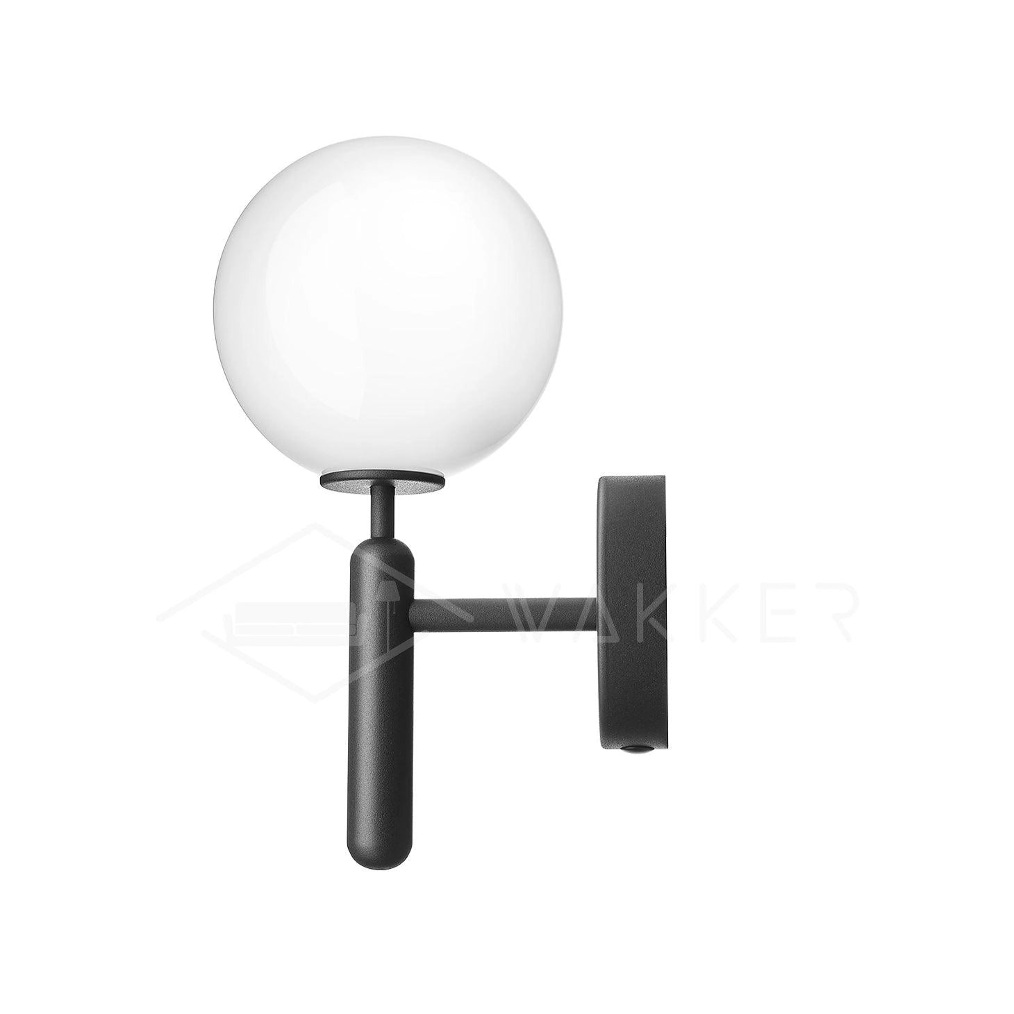 Modern brass globe wall sconce with LED light, mounted on a wooden wall, suitable for bedroom lighting.