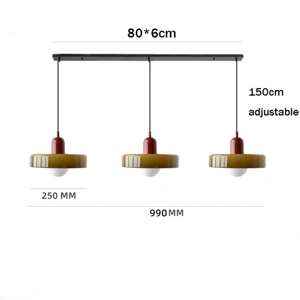 Modern brass pendant light with adjustable height, featuring a vibrant red cable, suitable for industrial kitchen decor.
