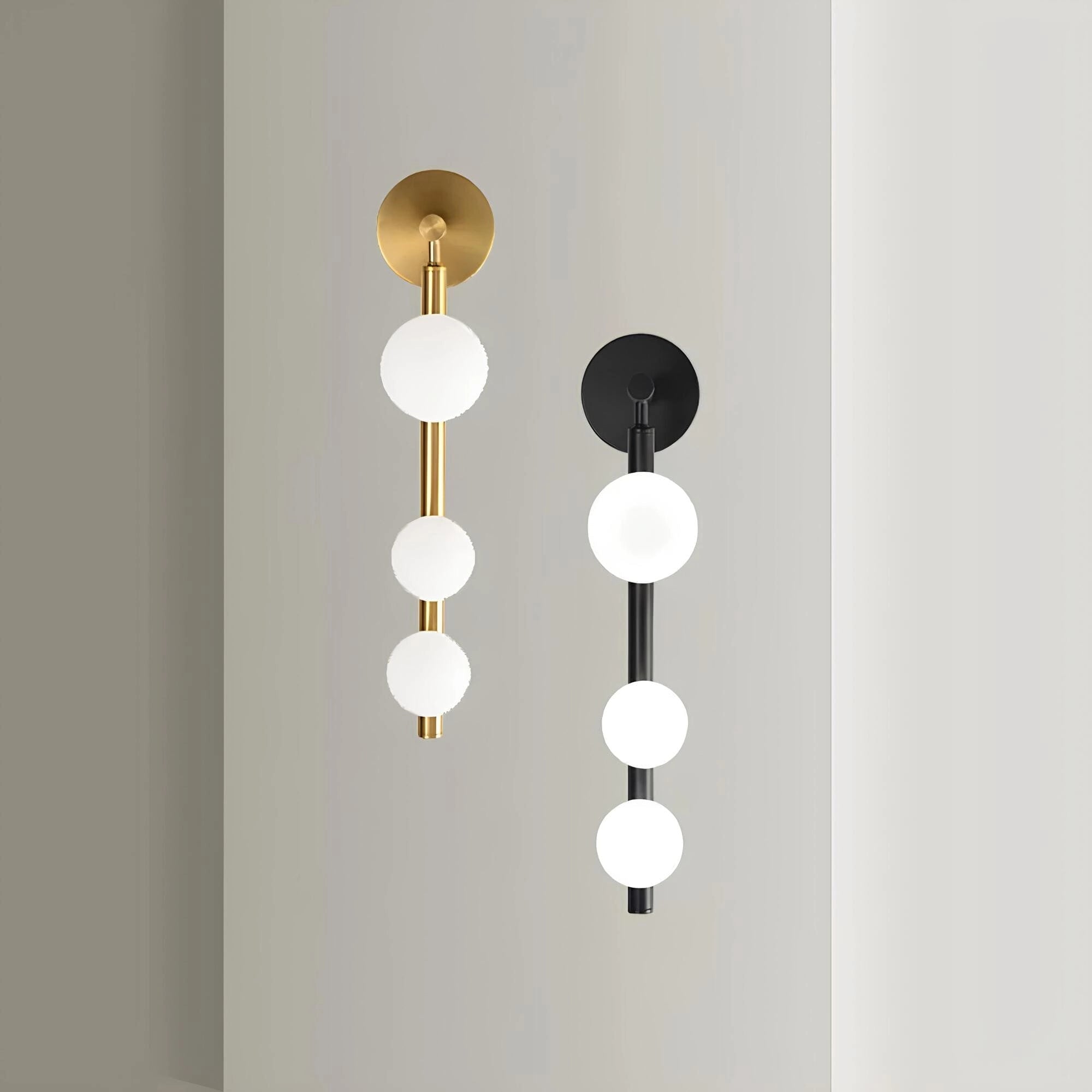 Caramel leather chair with a contemporary wall light featuring a circular lampshade, set against a wooden background.
