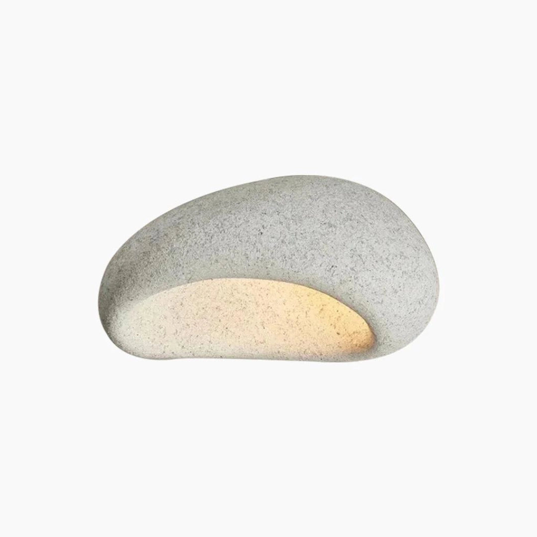 Modern ceiling lamp with a minimalist design in light gray, featuring a smooth oval shape and a 52cm diameter, providing warm ambient lighting.