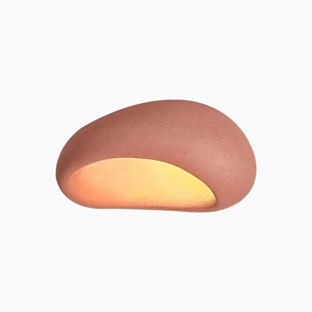 Modern minimalist red ceiling lamp with a circular design, measuring 52cm, providing warm ambient lighting against a wooden backdrop.