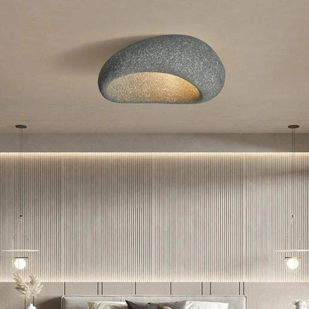 Modern dark gray ceiling lamp with a minimalist design, featuring a smooth and sleek finish. The lamp is suspended from the ceiling and provides warm ambient lighting, ideal for creating a cozy atmosphere in any room. Its 52cm diameter offers substantial light coverage, making it a stylish and functional addition to modern interiors.