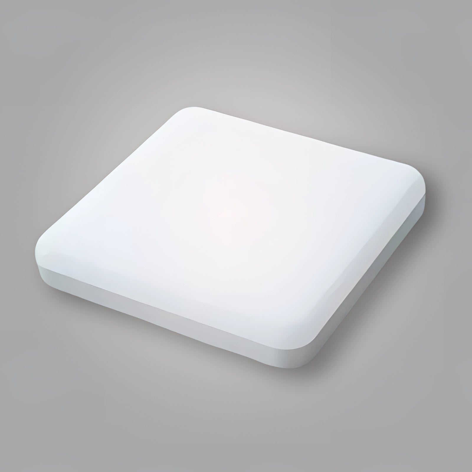 Ultrathin square wall light emitting cold white light, featuring a minimalist and futuristic design with a sleek, rectangular frame ideal for modern home interiors.
